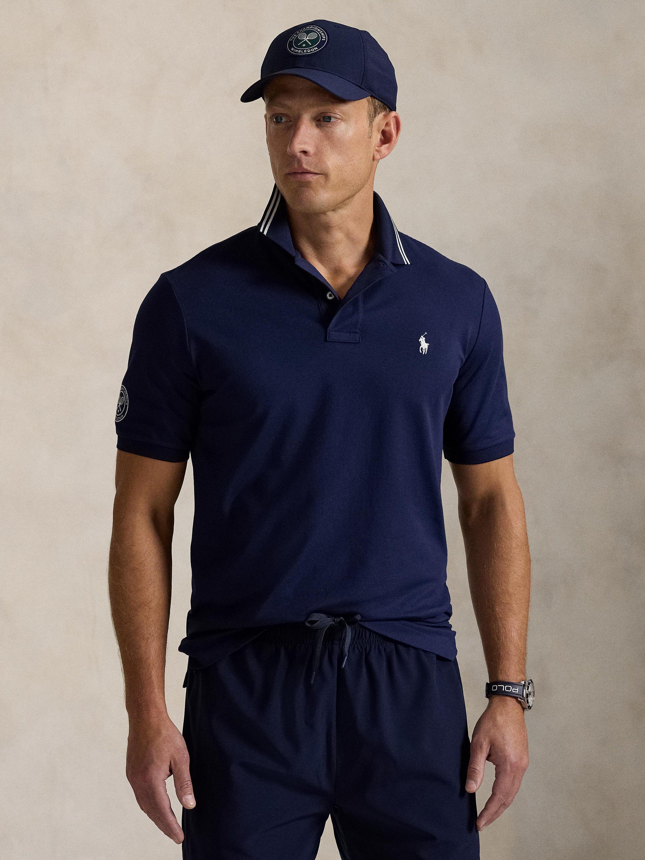 Product image 1 of 5, which shows Polo Ralph Lauren X Wimbledon Cotton Blend Regular Fit Short Sleeve Polo Shirt, Refined Navy, M