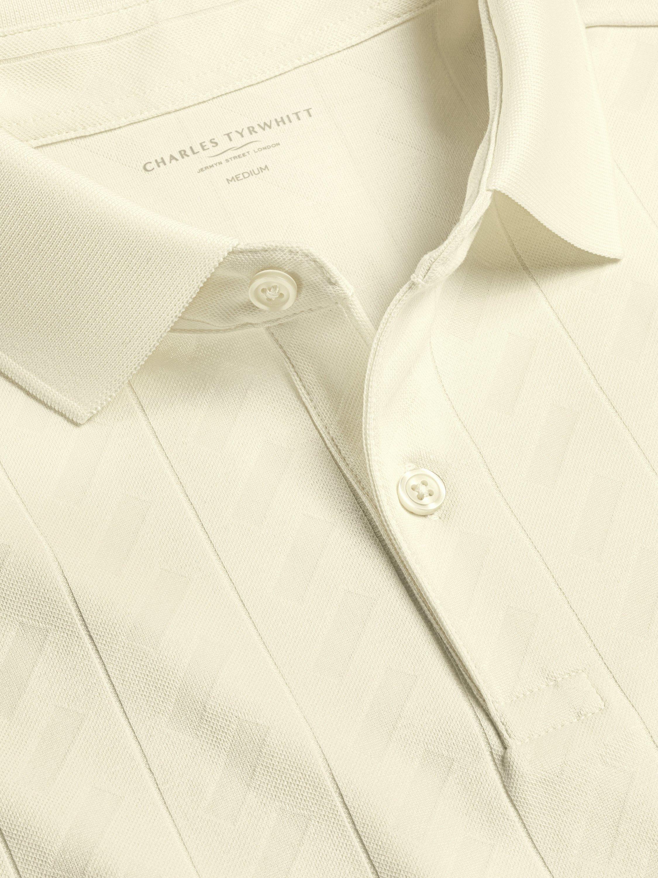 Product image 3 of 5, which shows Charles Tyrwhitt Short Sleeve Cotton Blend Polo Shirt, Cream, S