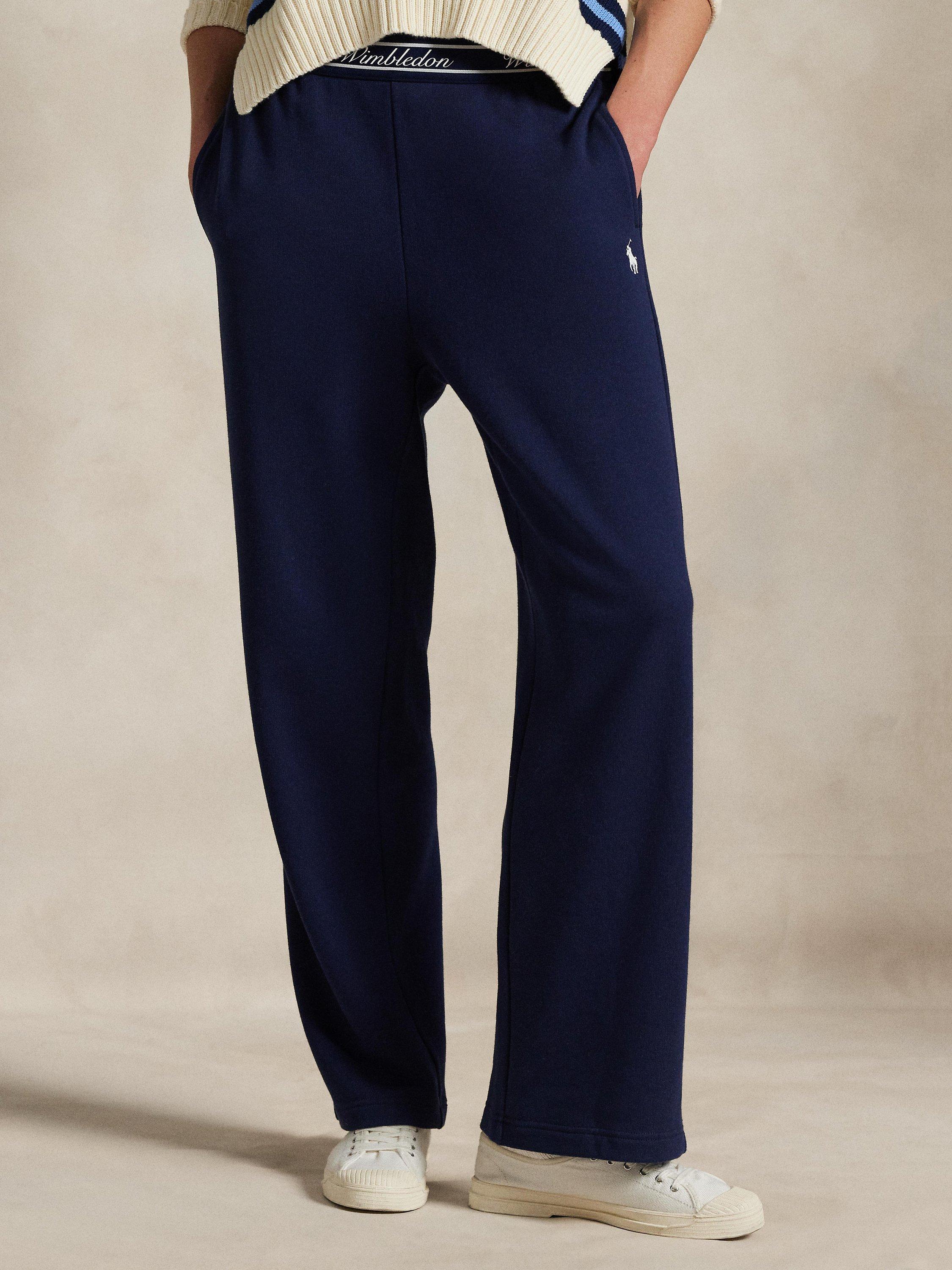 Product image 3 of 4, which shows Polo Ralph Lauren Wimbledon 2025 French Terry Trousers, Navy, XS
