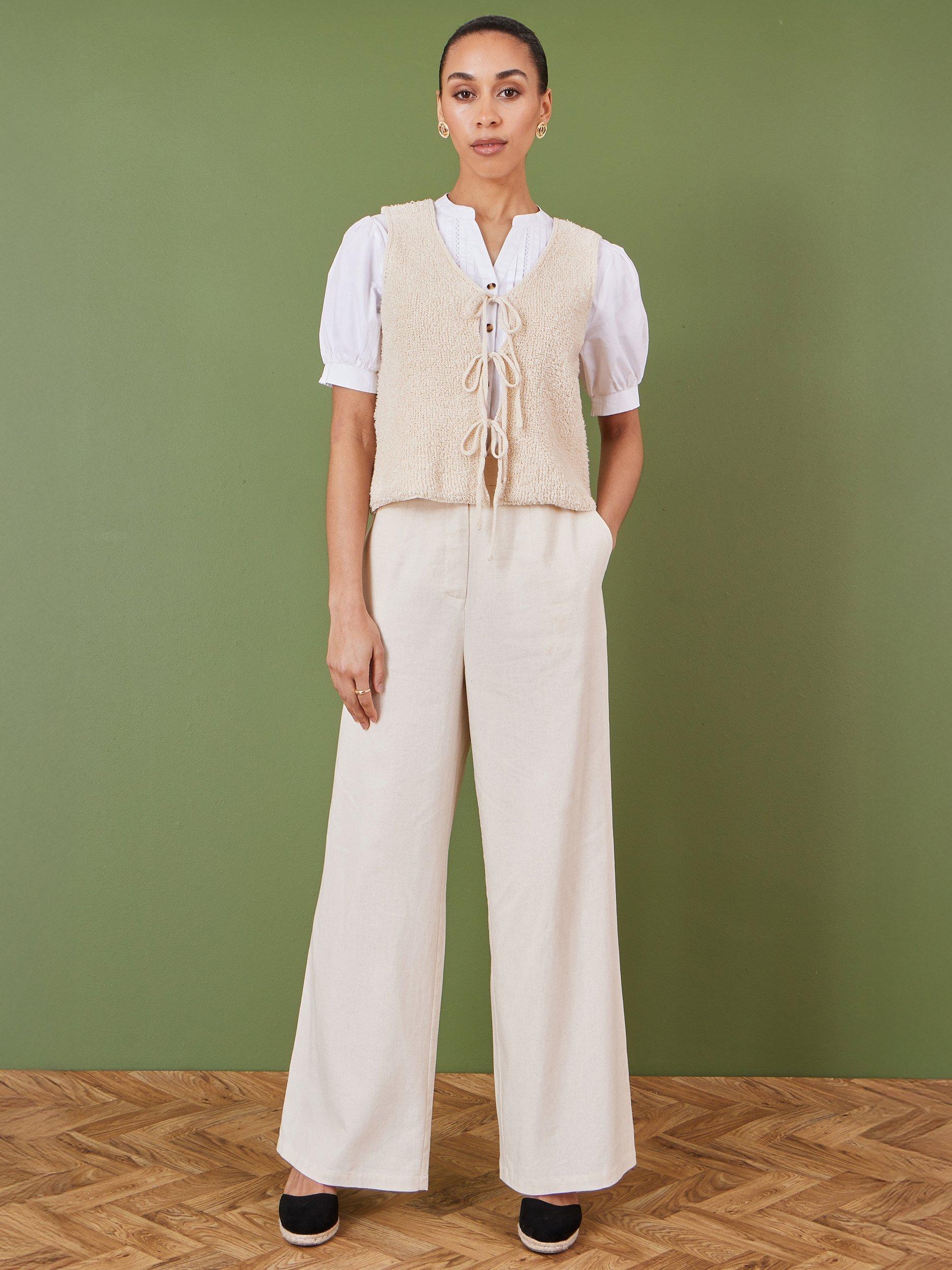 Product image 2 of 4, which shows Yumi Knitted Tie Detail Waistcoat, Beige, S
