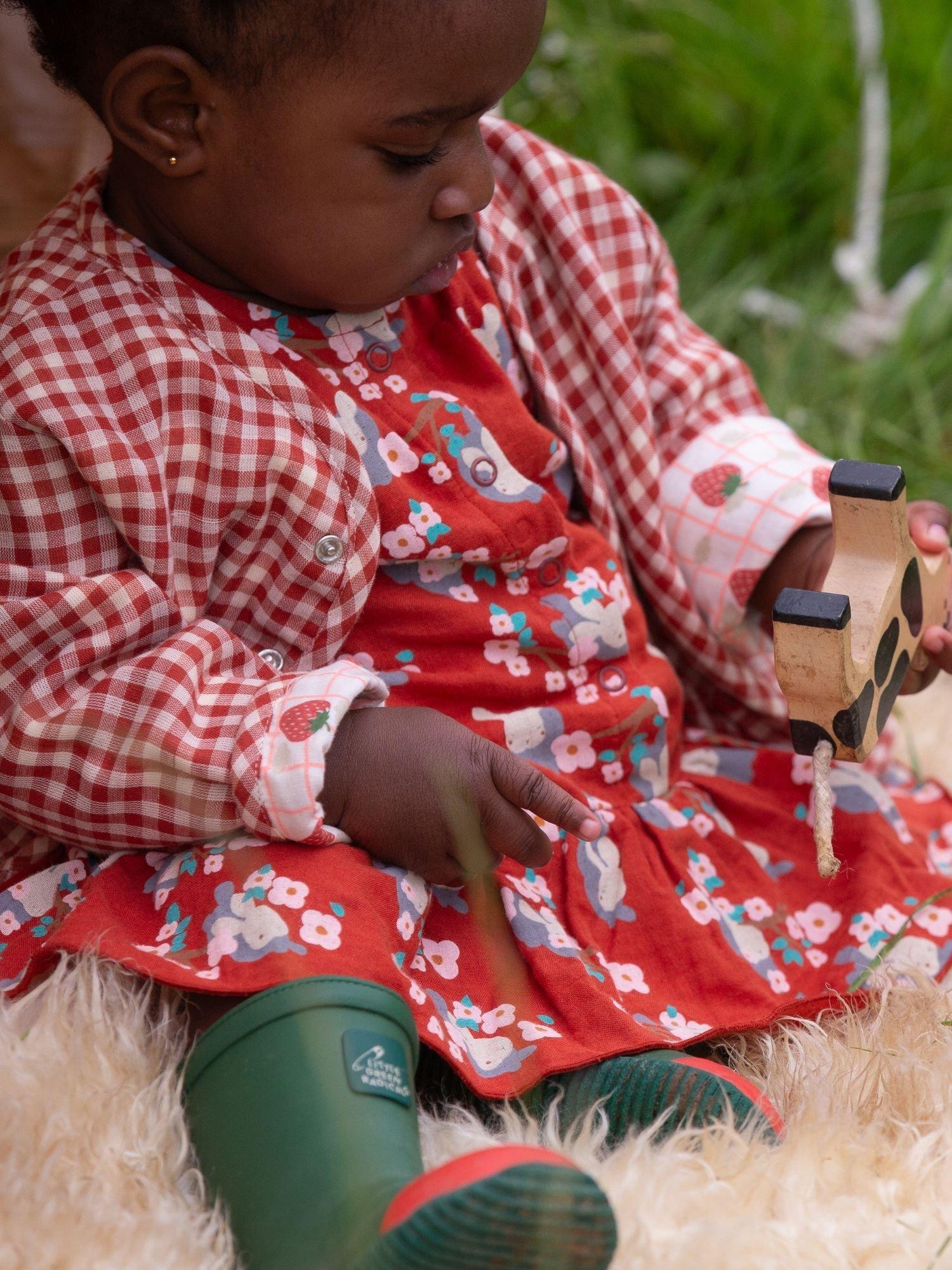 Product image 5 of 6, which shows Little Green Radicals Baby Rabbit Ruffle Pure Organic Cotton Romper, Red/Multi, 3-6 months
