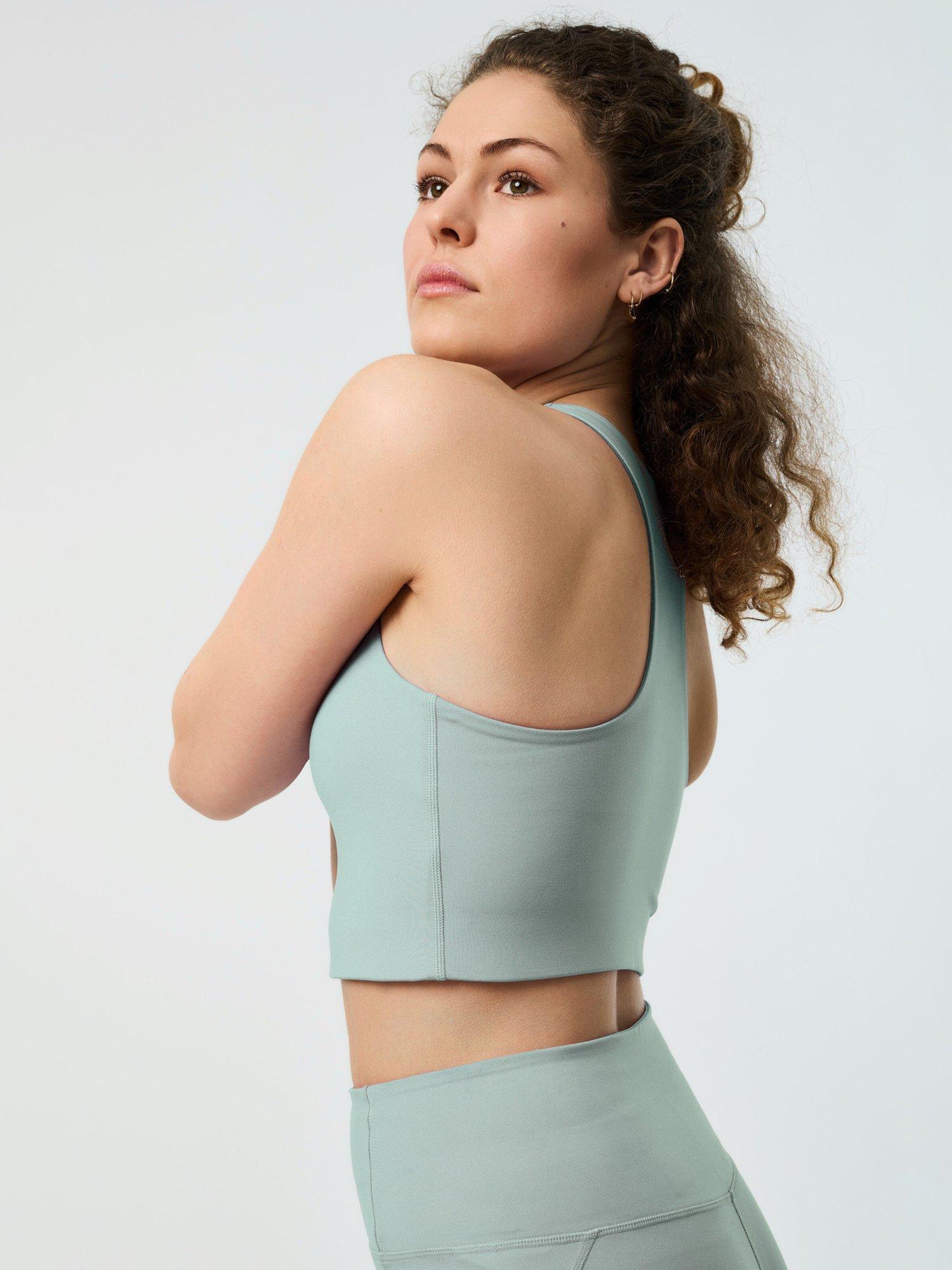 Product image 4 of 6, which shows Girlfriend Collective Dylan Cropped Sports Bra, Atmosphere, XS