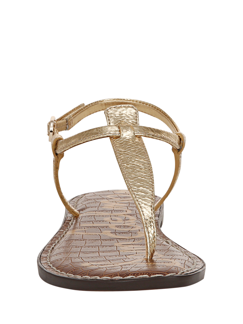 Product image 4 of 6, which shows Sam Edelman Gigi Thong Sandal, Amber Gold Metallic, 3