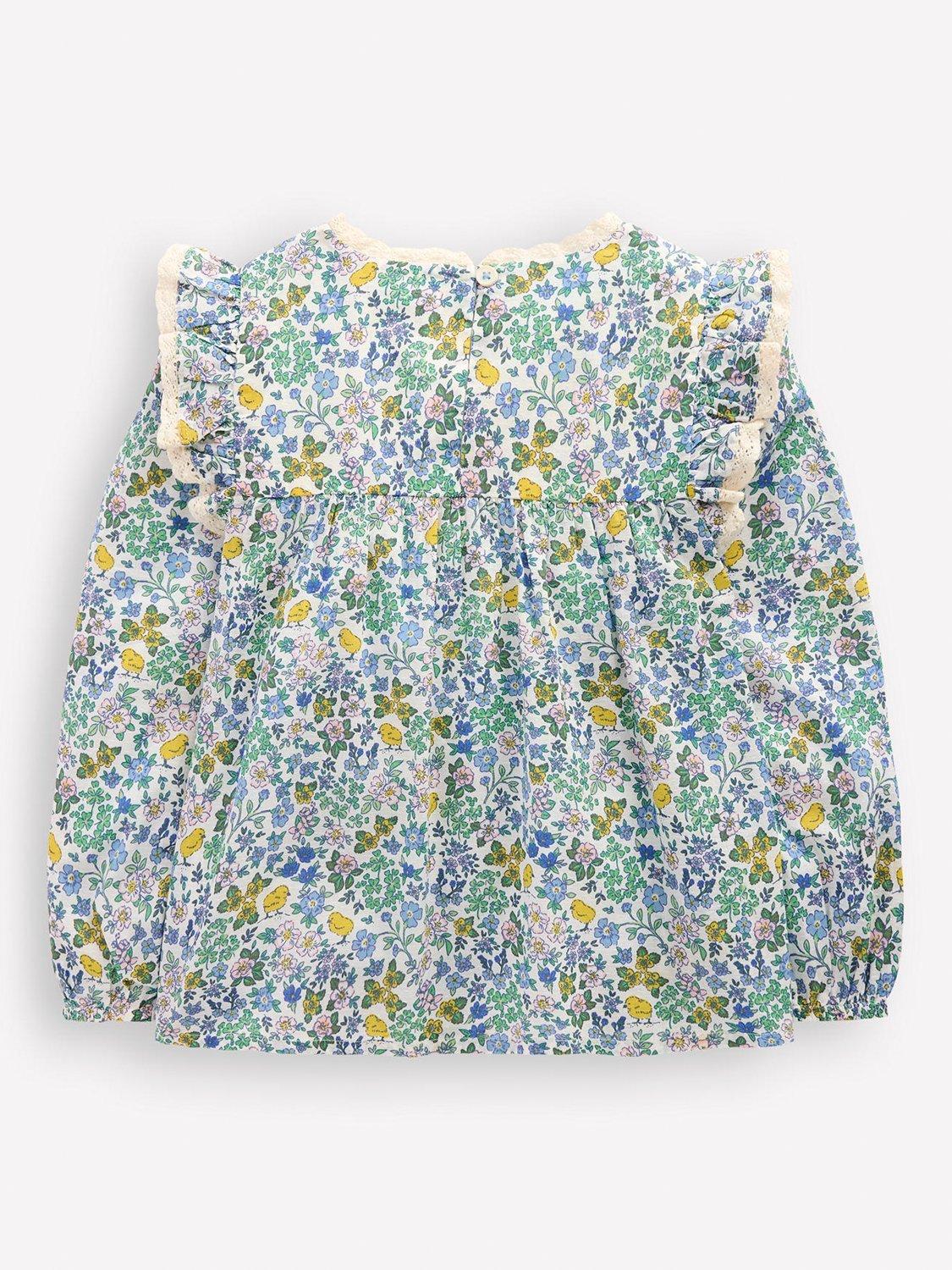 Product image 2 of 3, which shows Mini Boden Kids' Dorothy Smock Blouse, White Chick Floral, 2-3 years