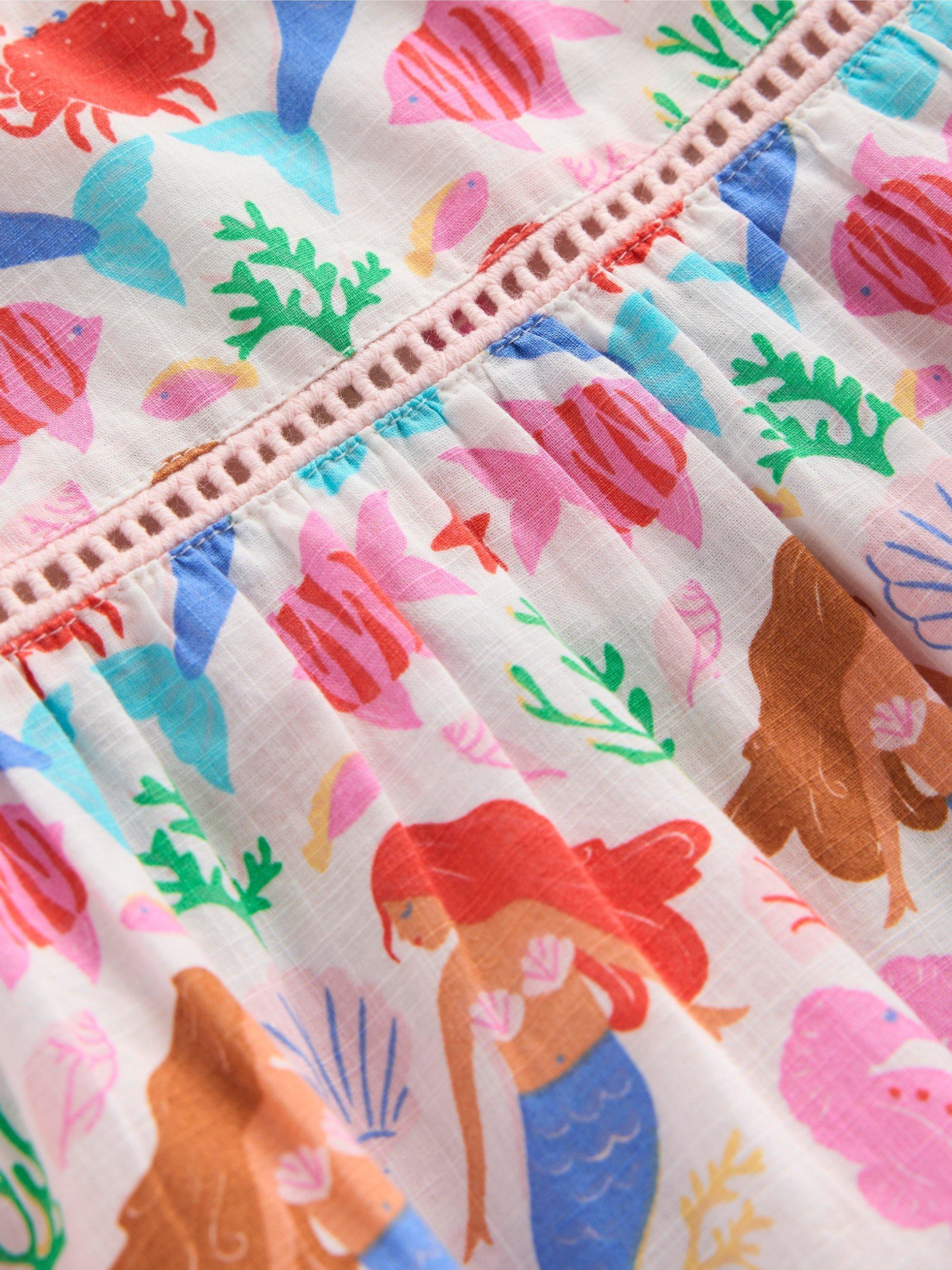 Product image 3 of 3, which shows Mini Boden Kids' Celia Woven Cotton Holiday Dress, Ivory Mermaids, 11-12 years