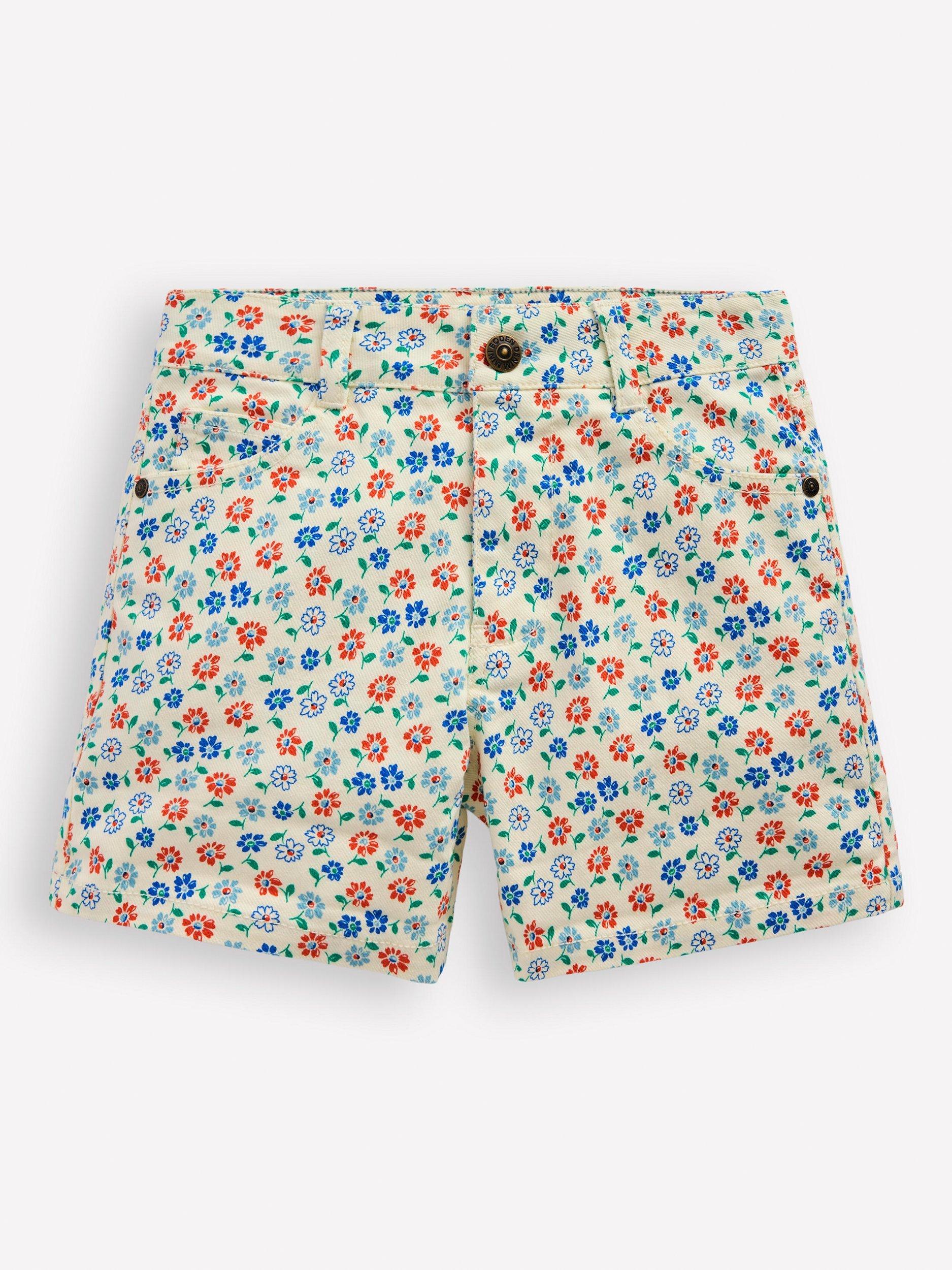 Product image 1 of 3, which shows Mini Boden Kids' Denim Shorts, White Vintage Daisy, 4-5 years