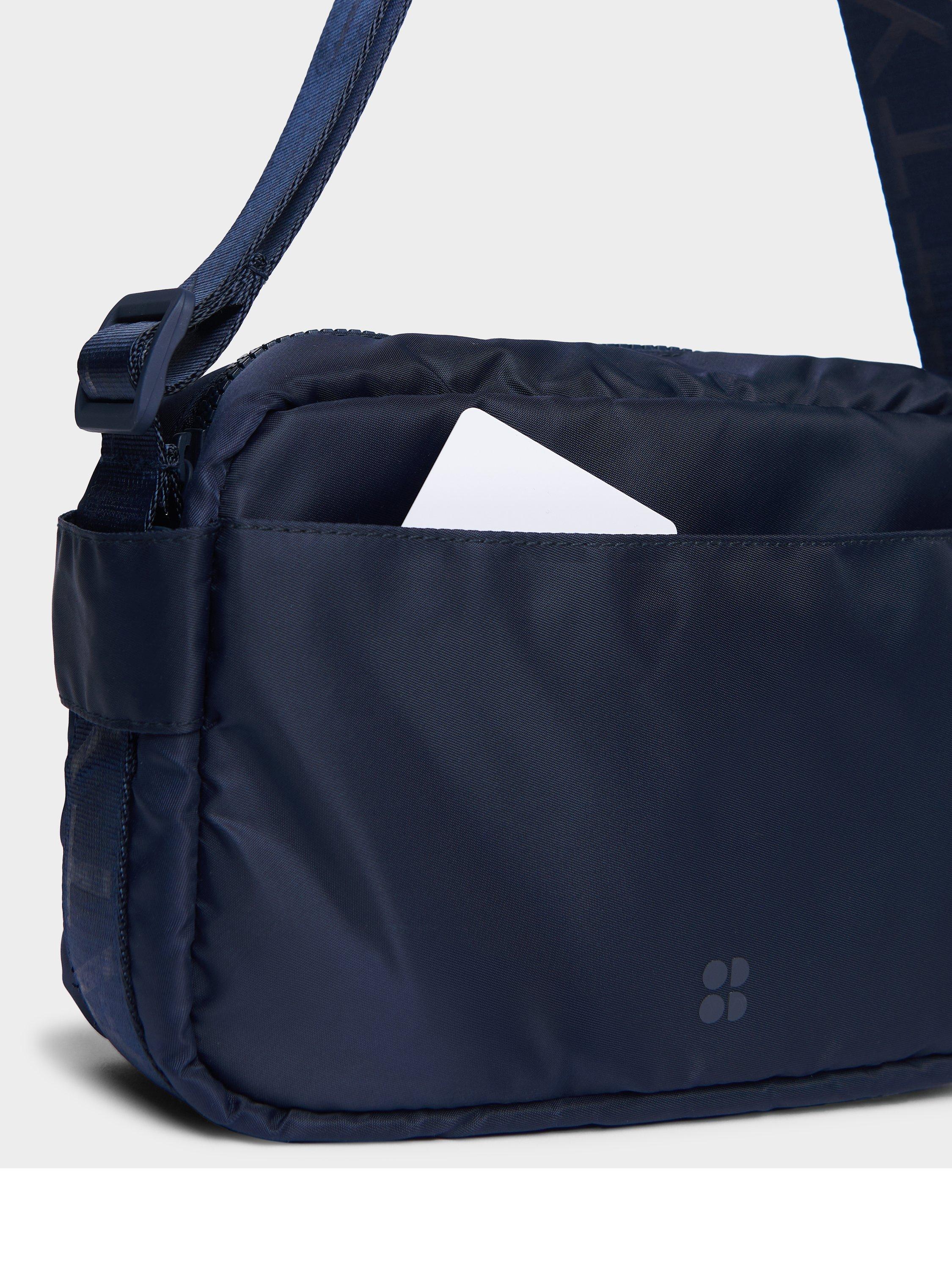 Product image 3 of 5, which shows Sweaty Betty Motion Travel Crossbody Bag, Navy Blue