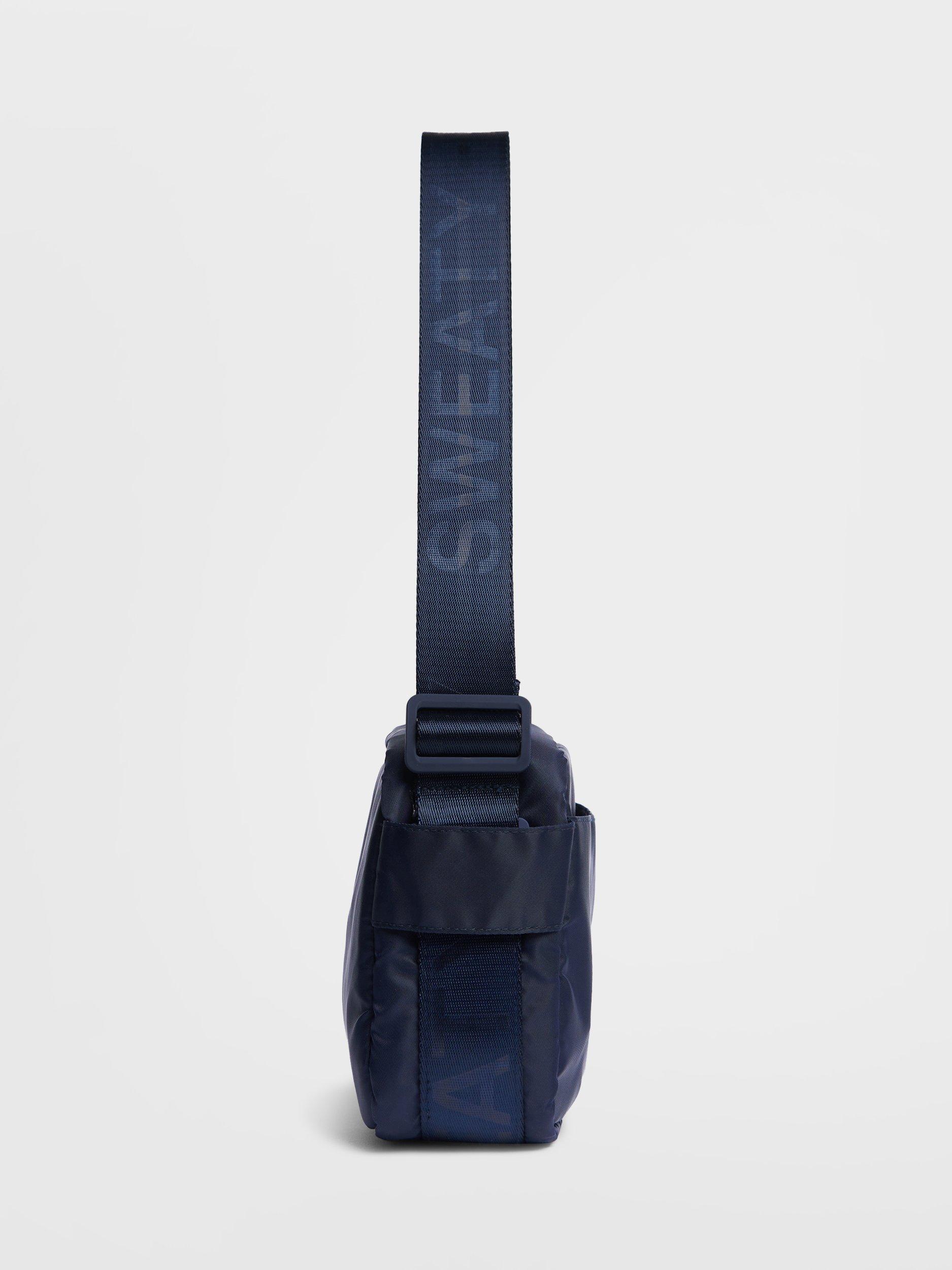Product image 4 of 5, which shows Sweaty Betty Motion Travel Crossbody Bag, Navy Blue