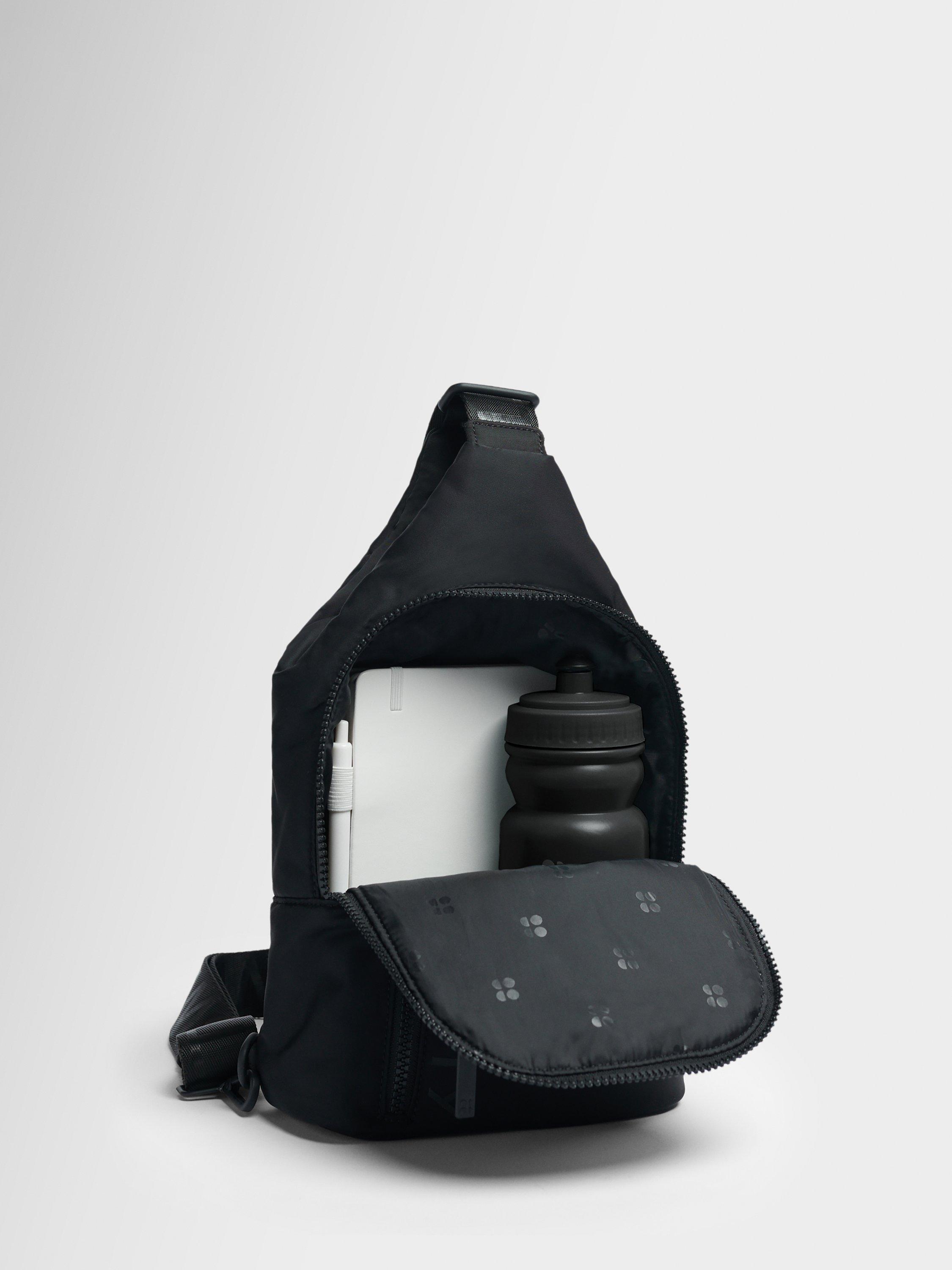 Product image 3 of 5, which shows Sweaty Betty Motion Sling Bag, Black