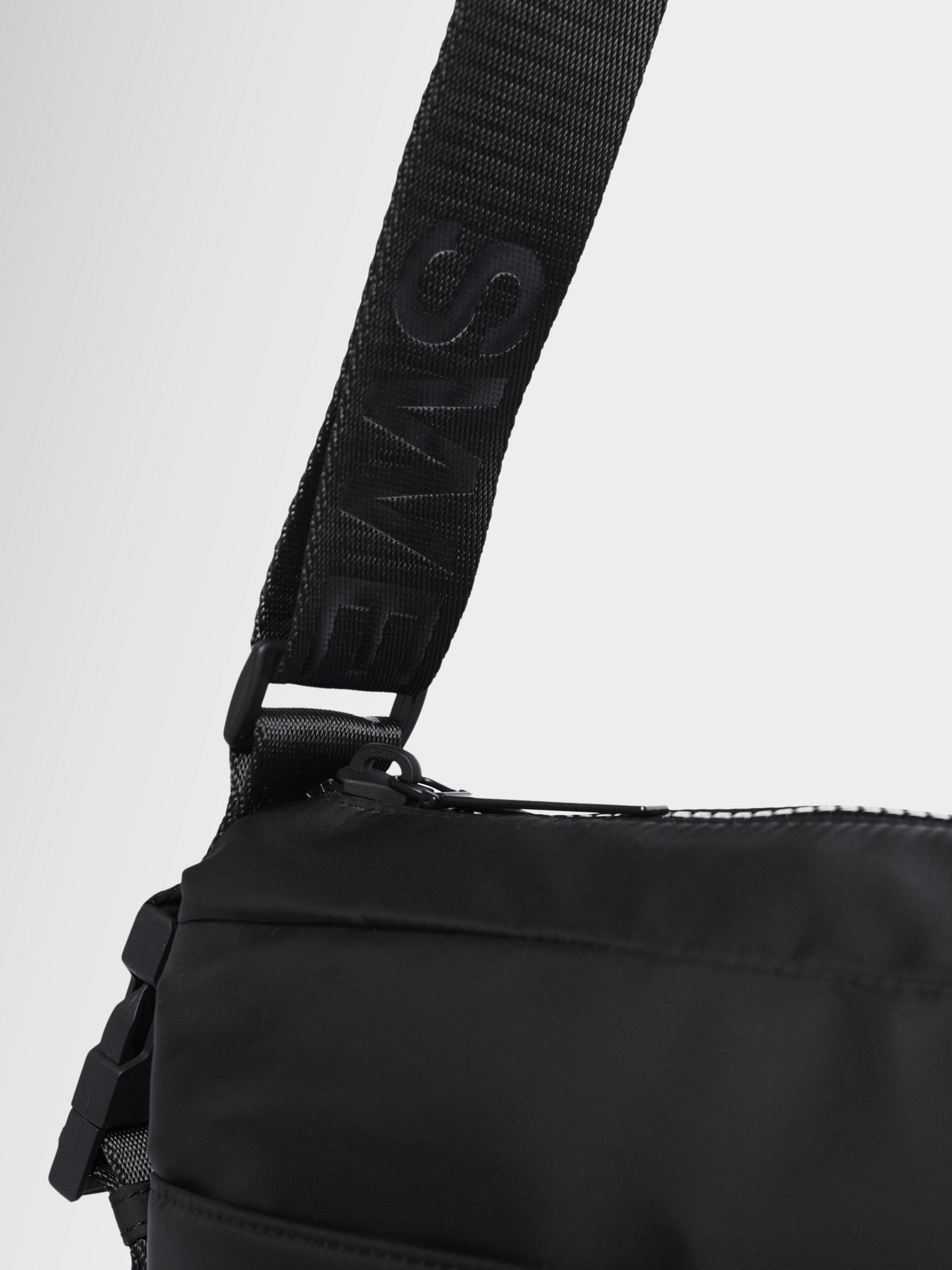 Product image 5 of 6, which shows Sweaty Betty Strive Crossbody Bag, Black