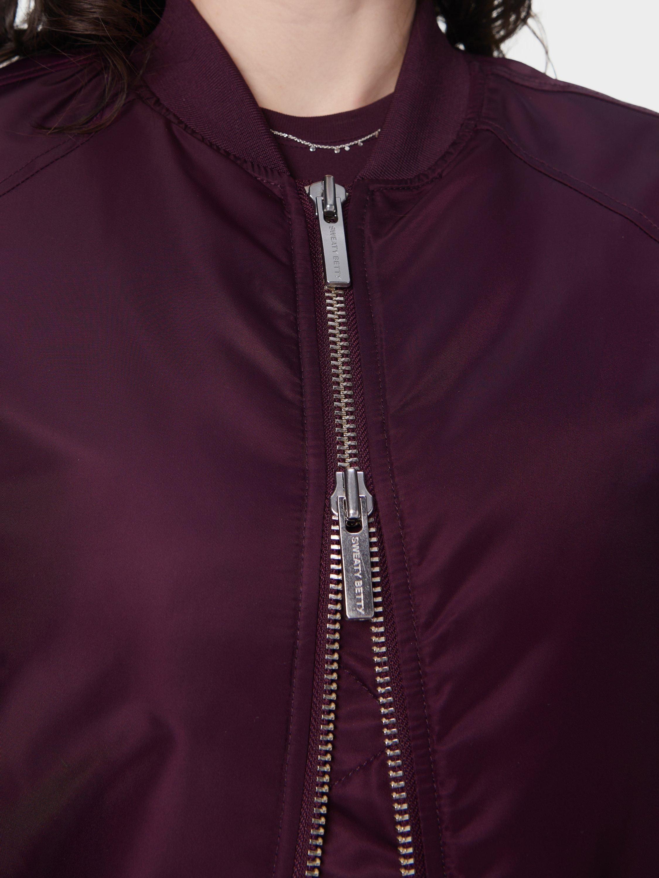 Product image 5 of 7, which shows Sweaty Betty Cityscape Longline Bomber Jackets, Midnight Cherry, XXS