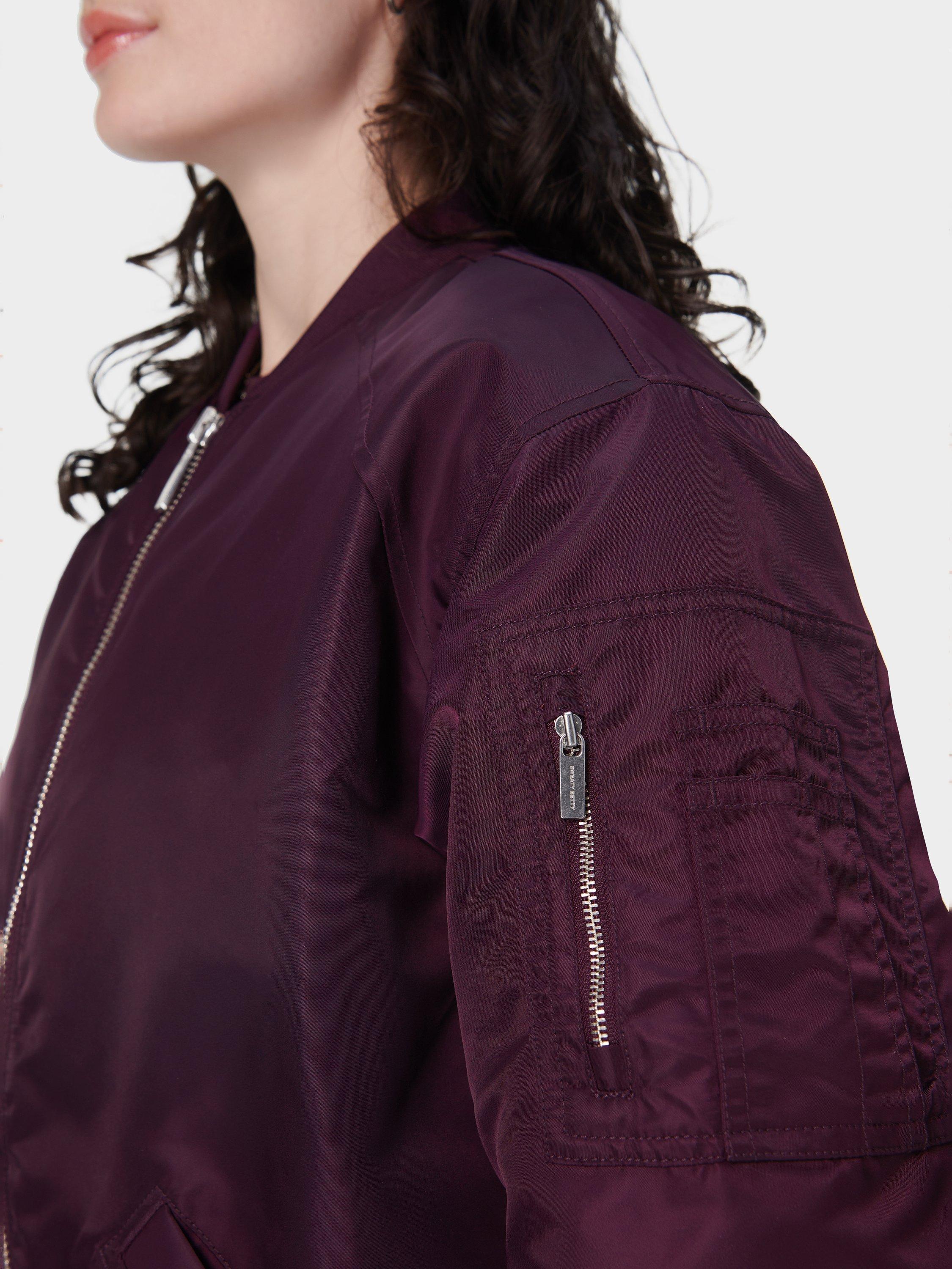 Product image 7 of 7, which shows Sweaty Betty Cityscape Longline Bomber Jackets, Midnight Cherry, XXS