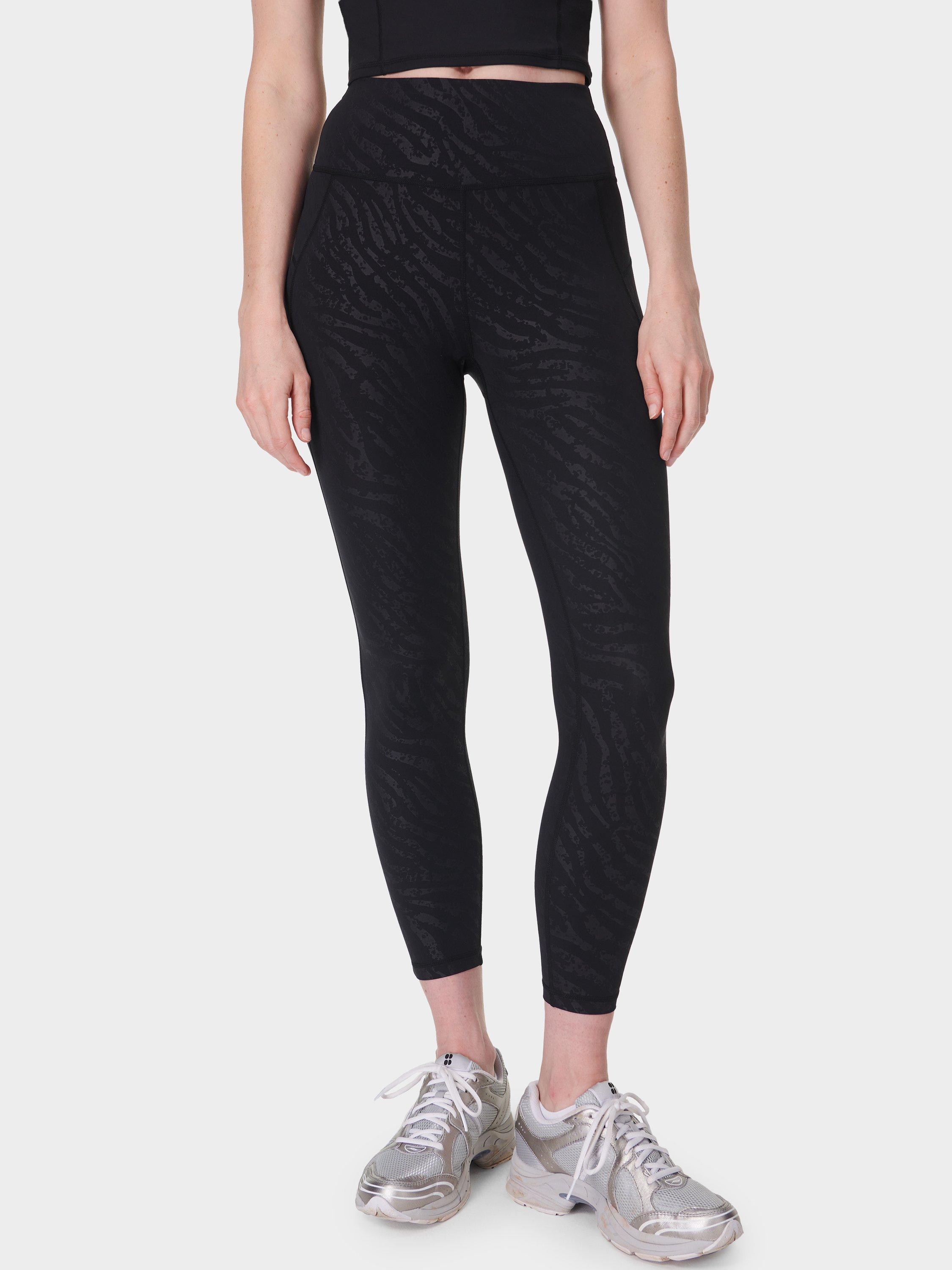 Product image 1 of 6, which shows Sweaty Betty Embossed All Day 7/8 Leggings, Black, XXS
