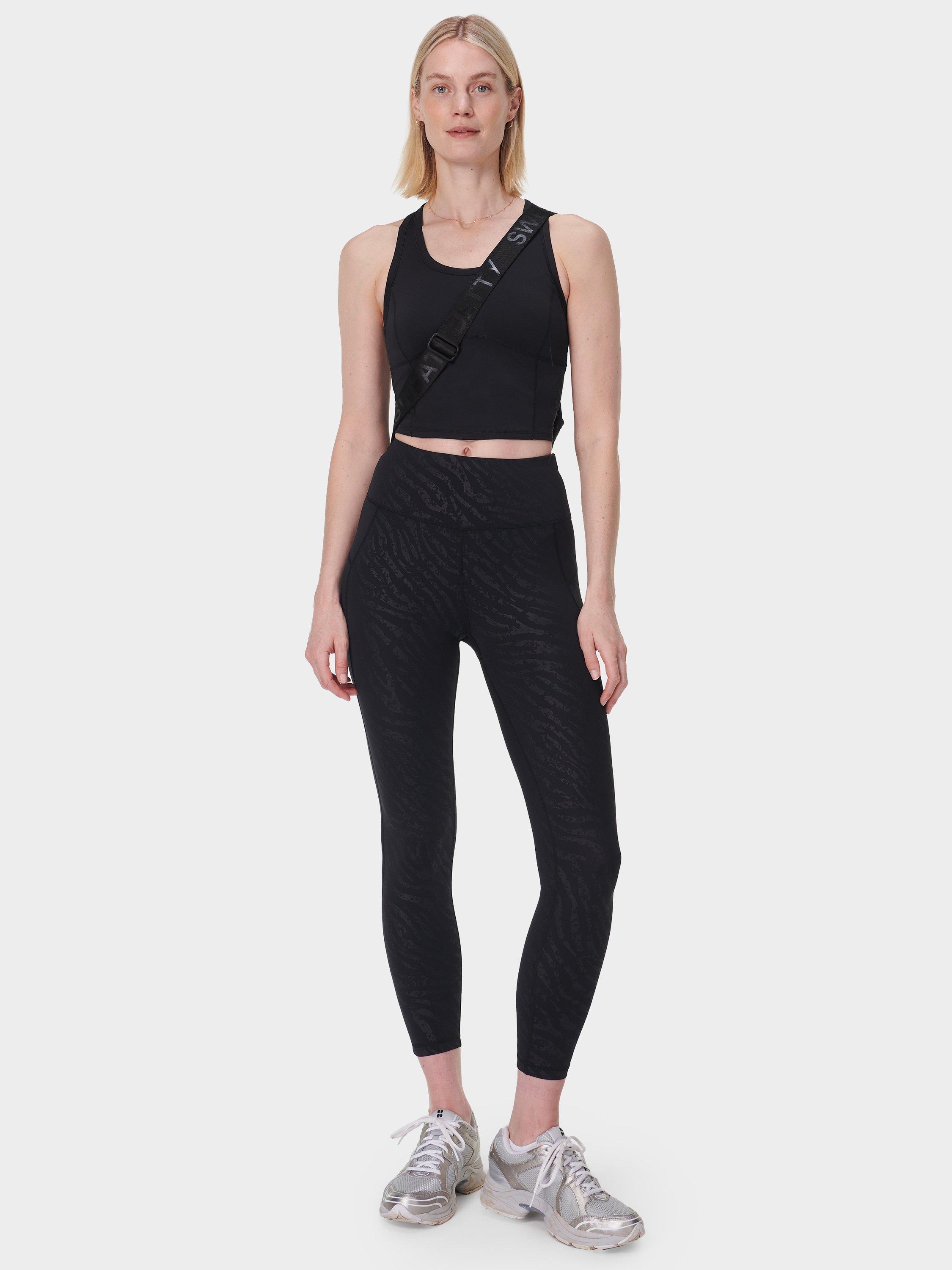 Product image 3 of 6, which shows Sweaty Betty Embossed All Day 7/8 Leggings, Black, XXS