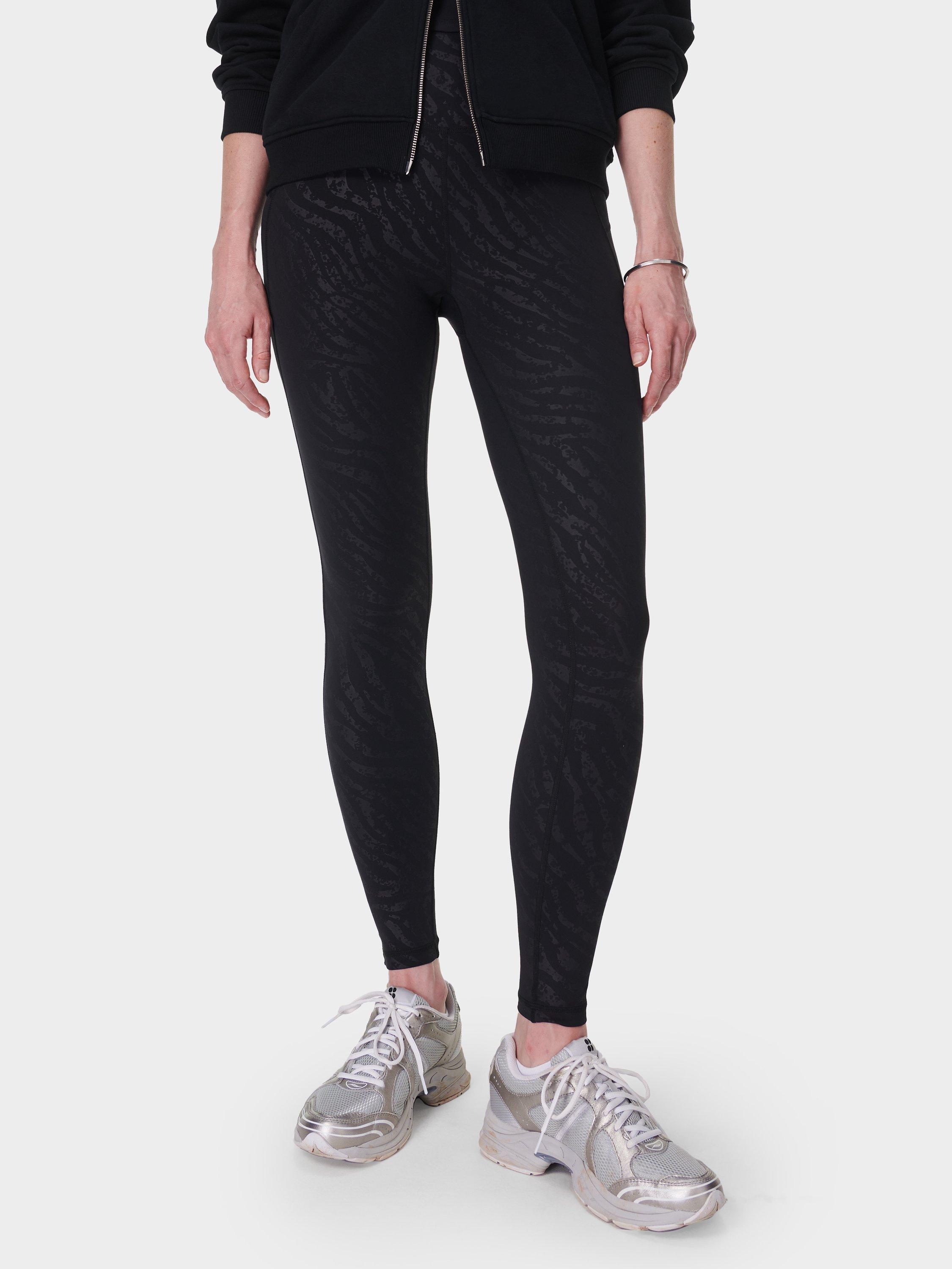 Product image 1 of 8, which shows Sweaty Betty Embossed All Day Leggings, Black, XXS