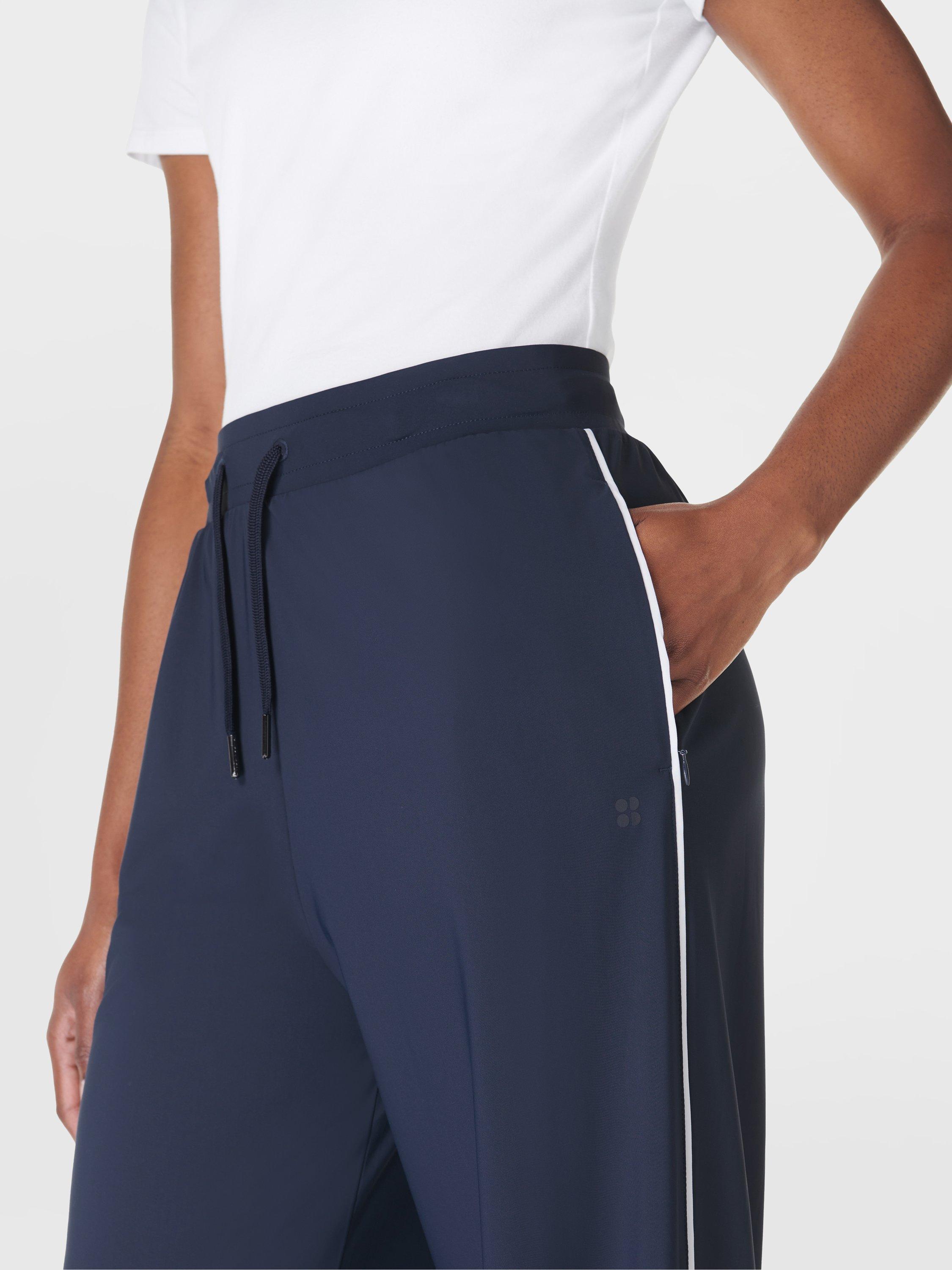 Product image 5 of 7, which shows Sweaty Betty Explorer 32" Wide Leg Trousers, Navy Blue, XXS