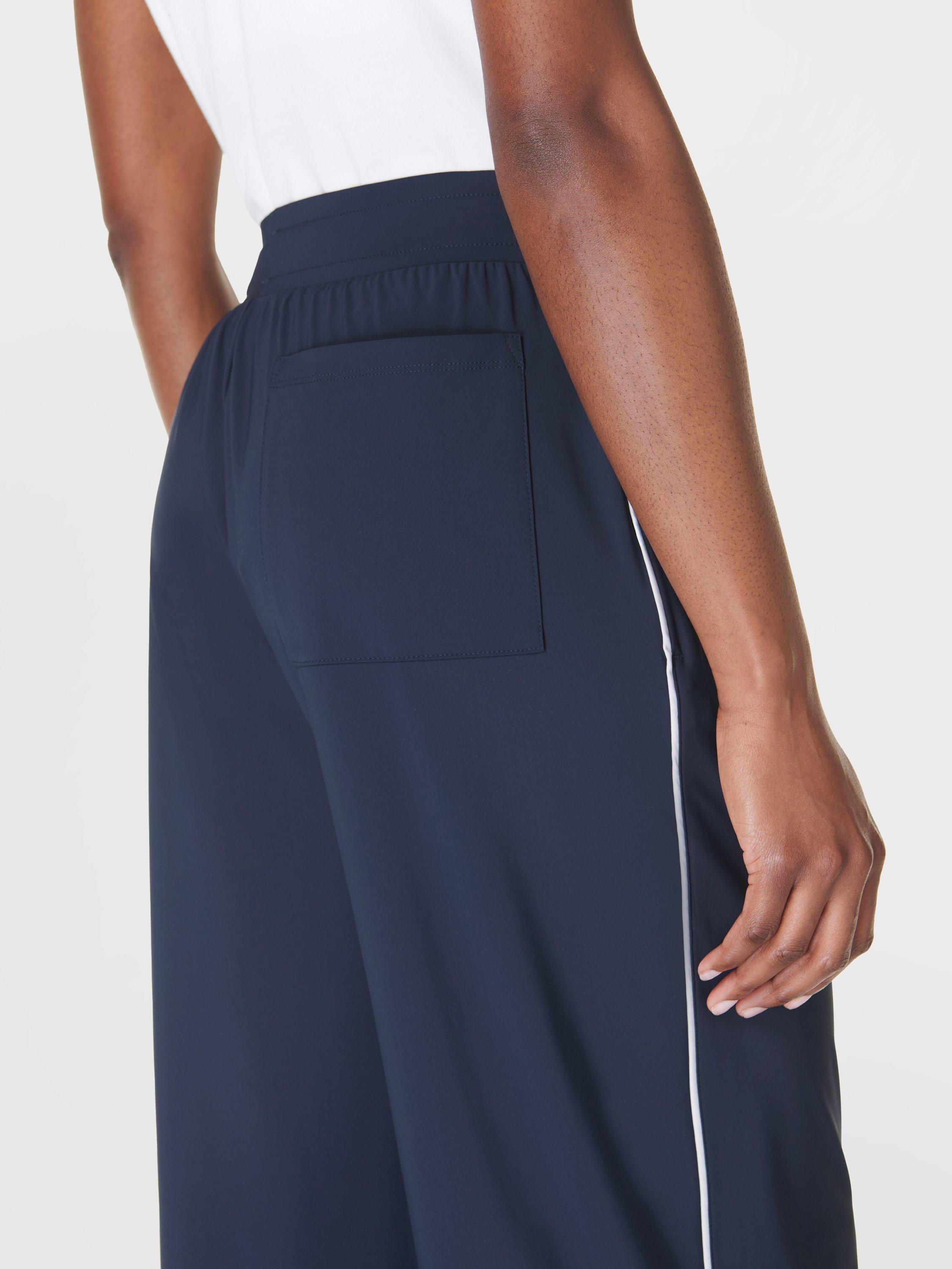 Product image 6 of 7, which shows Sweaty Betty Explorer 32" Wide Leg Trousers, Navy Blue, XXS