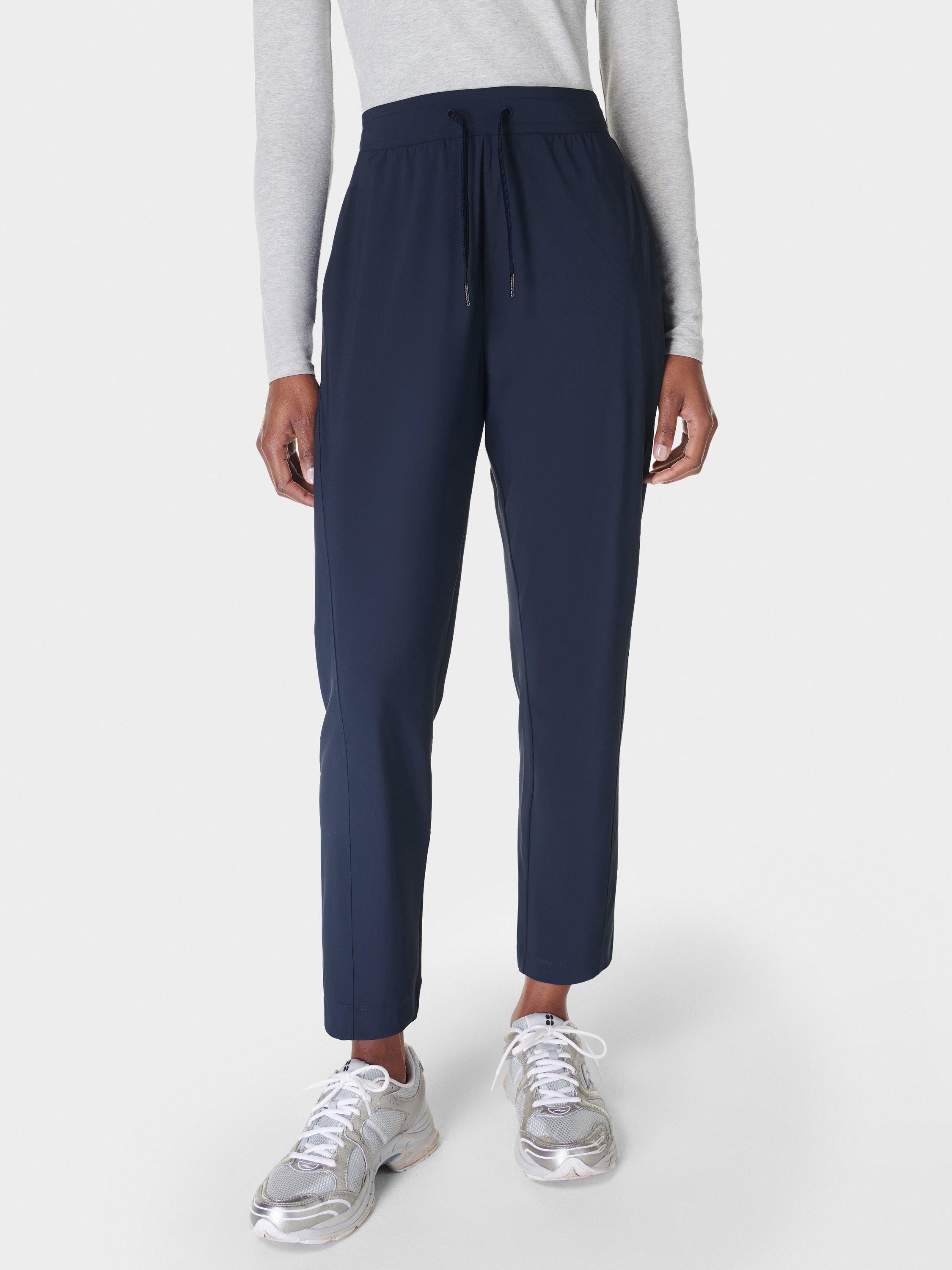 Product image 1 of 6, which shows Sweaty Betty Explorer 27" Trousers, Navy Blue, XXS