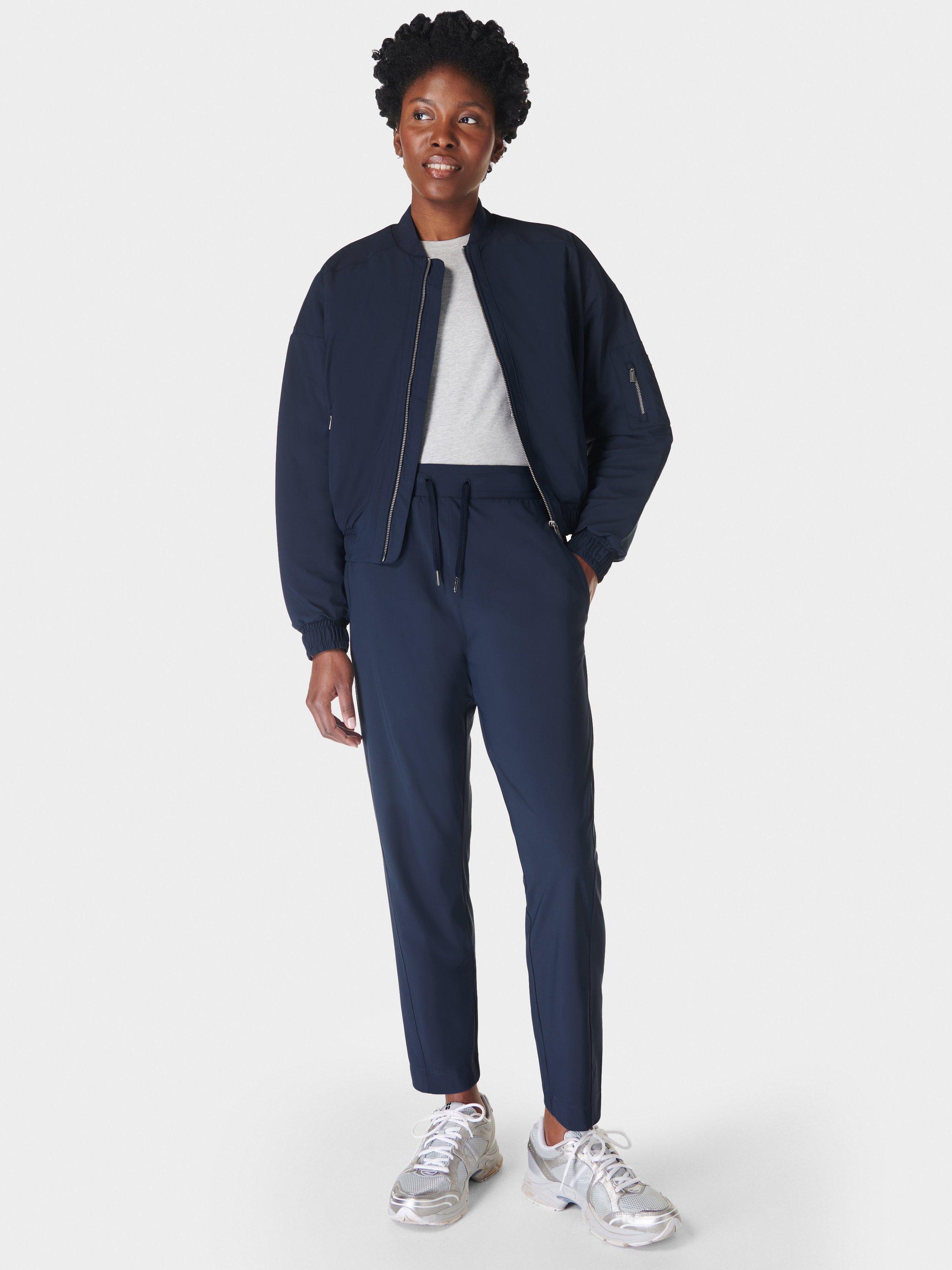 Product image 2 of 6, which shows Sweaty Betty Explorer 27" Trousers, Navy Blue, XXS