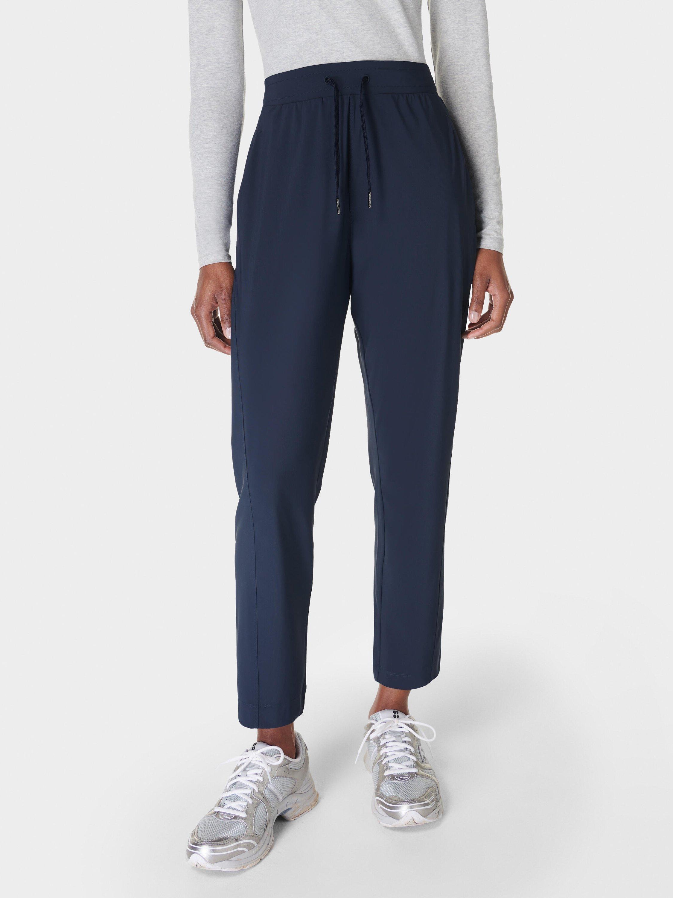 Product image 1 of 6, which shows Sweaty Betty Explorer 25" Trousers, Navy, XXS