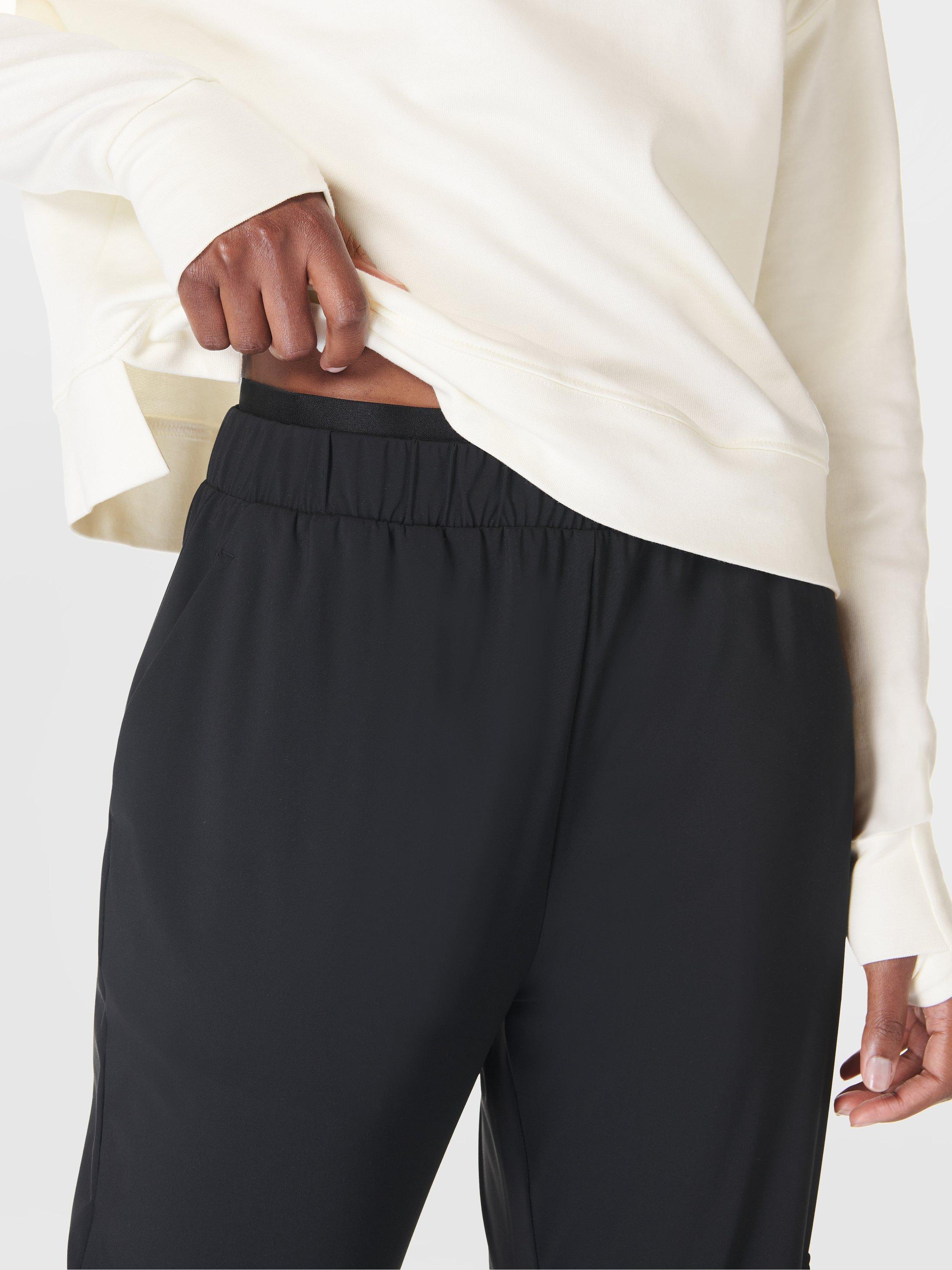 Product image 5 of 7, which shows Sweaty Betty Explorer Cargo Trousers, Black, XXS