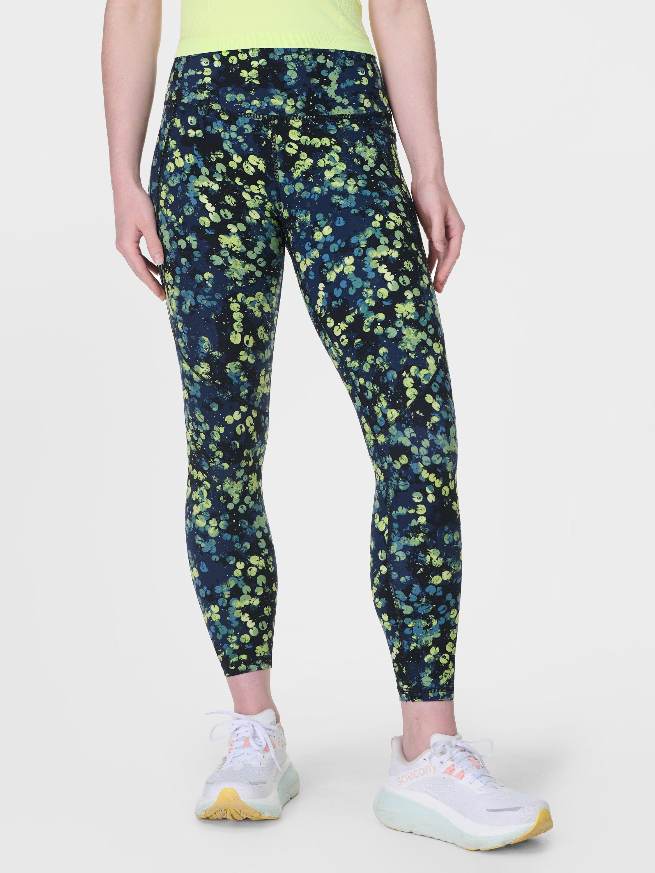 Product image 1 of 8, which shows Sweaty Betty Power 7/8 Workout Leggings, Green Lilypad Print, XXS