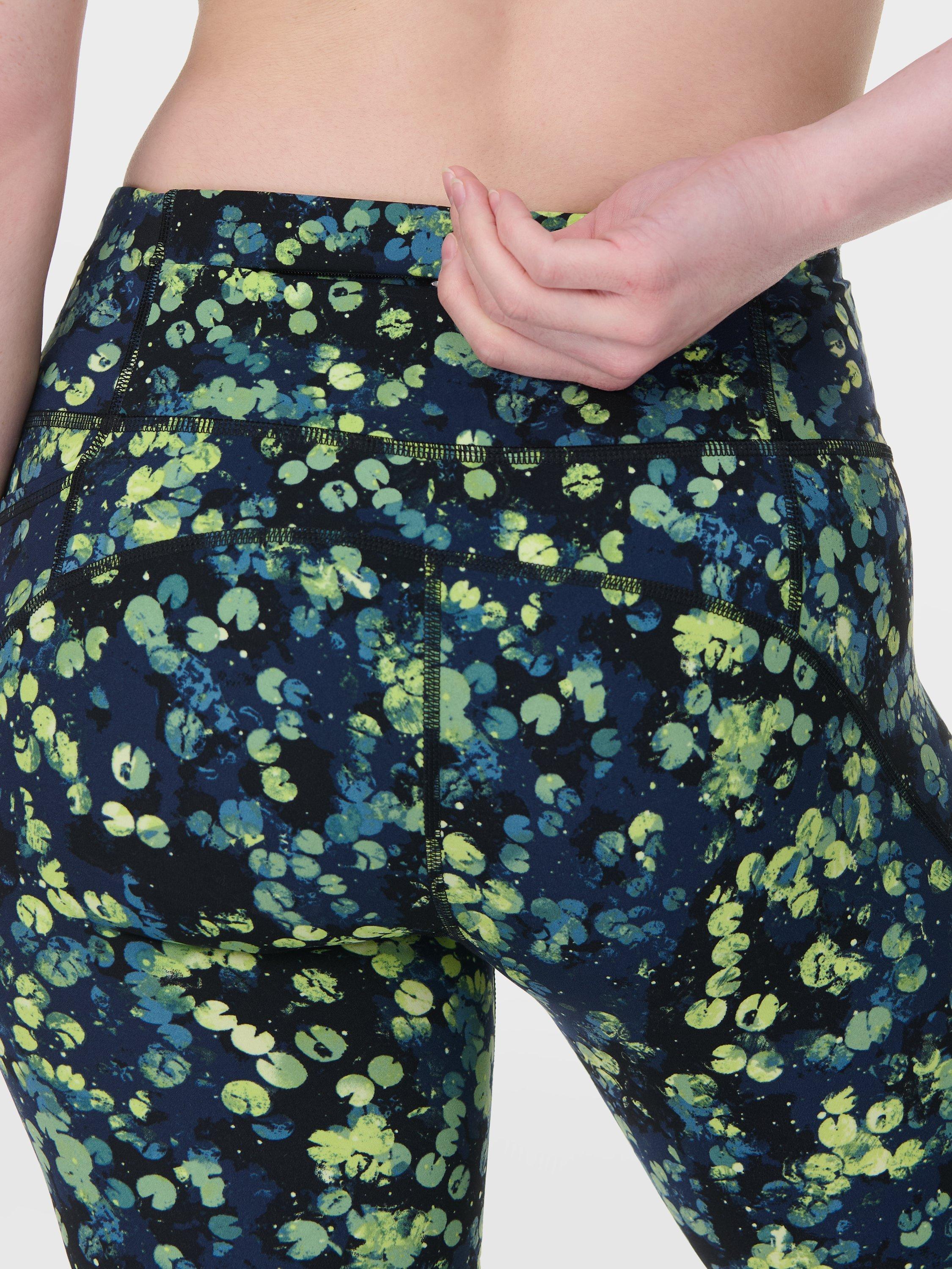Product image 5 of 8, which shows Sweaty Betty Power 7/8 Workout Leggings, Green Lilypad Print, XXS