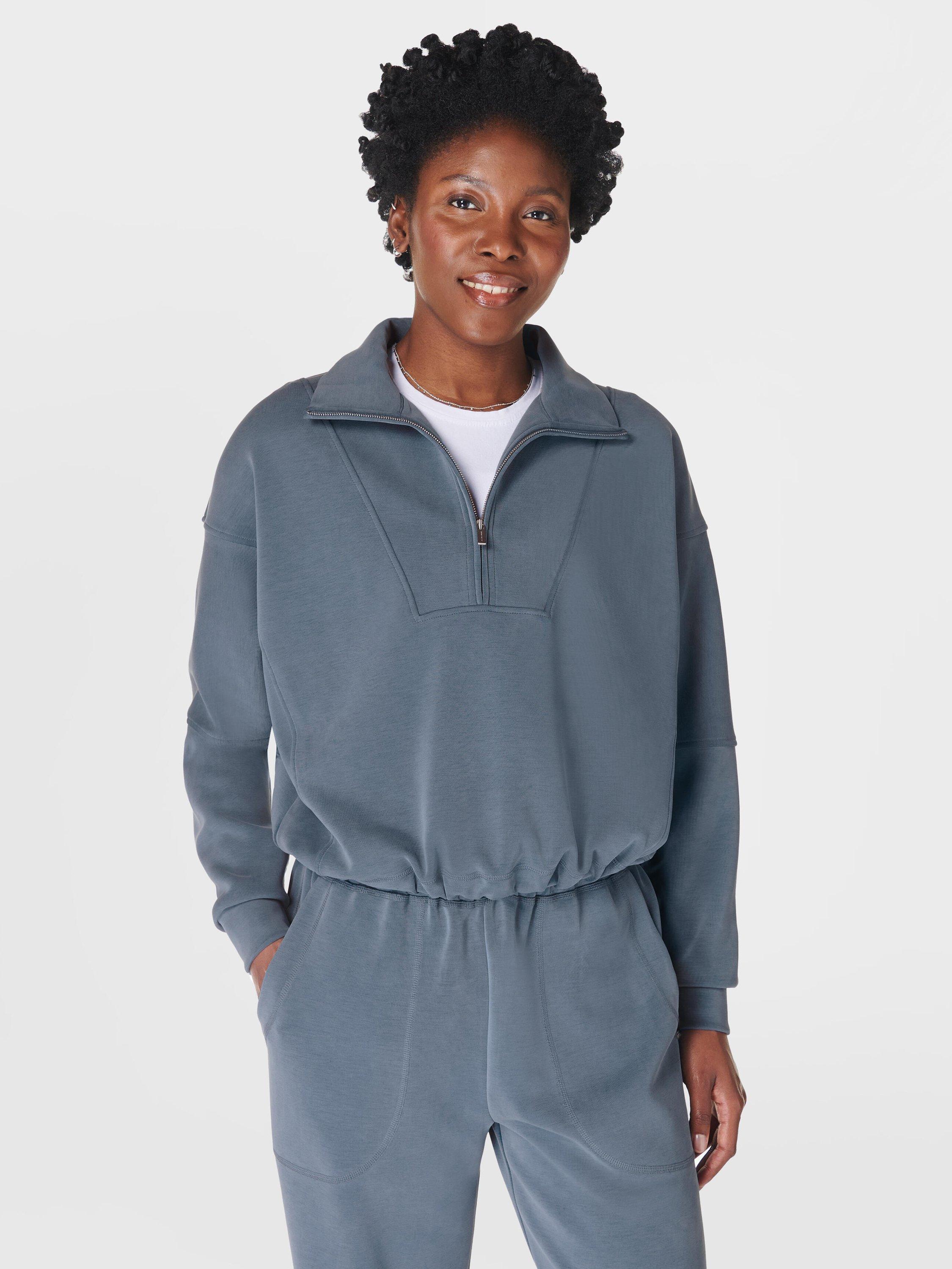 Product image 1 of 6, which shows Sweaty Betty Sand Wash Funnel Neck Half Zip Sweatshirt, Subdued Blue, XXS