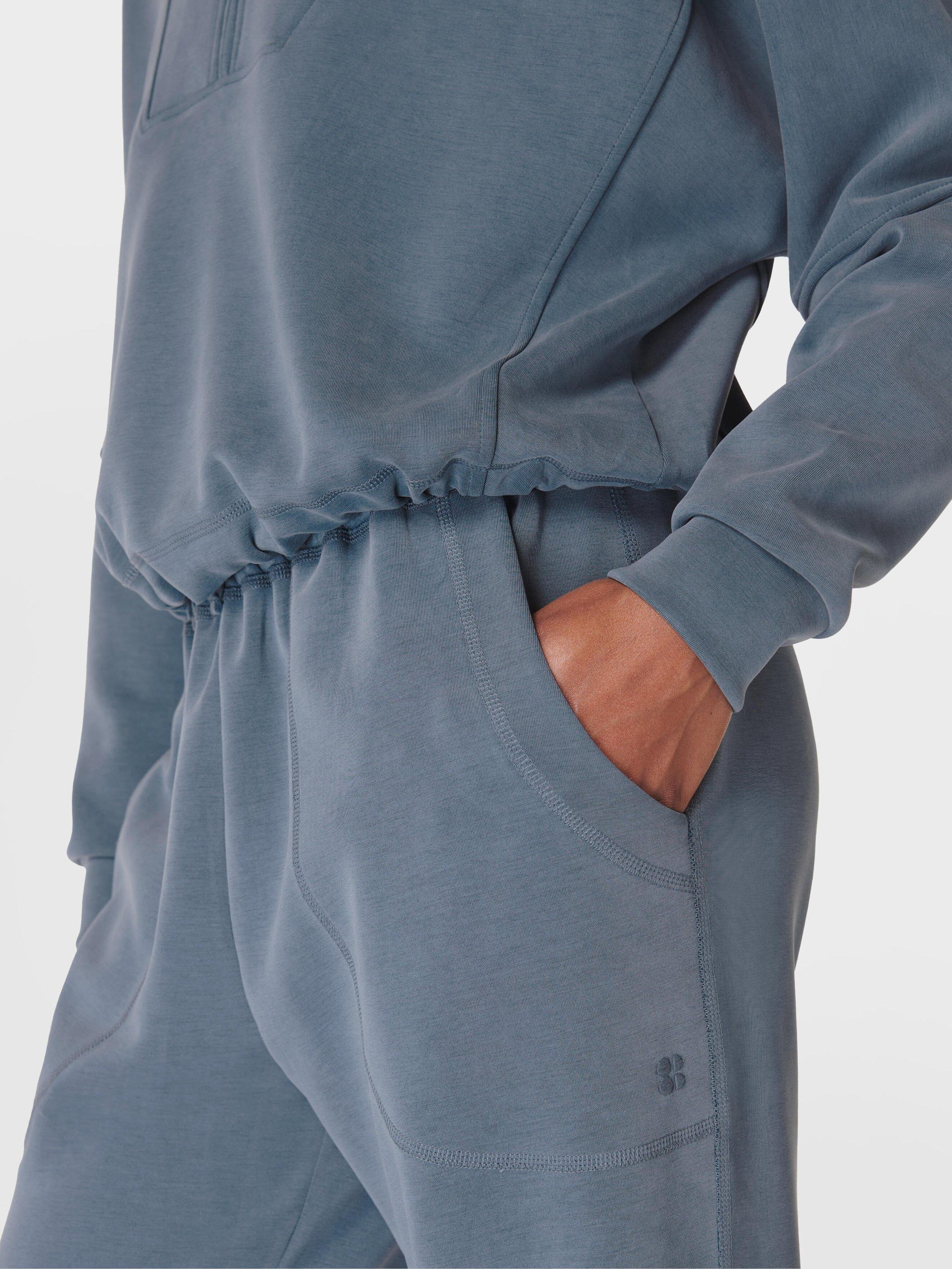 Product image 4 of 6, which shows Sweaty Betty Sand Wash Funnel Neck Half Zip Sweatshirt, Subdued Blue, XXS