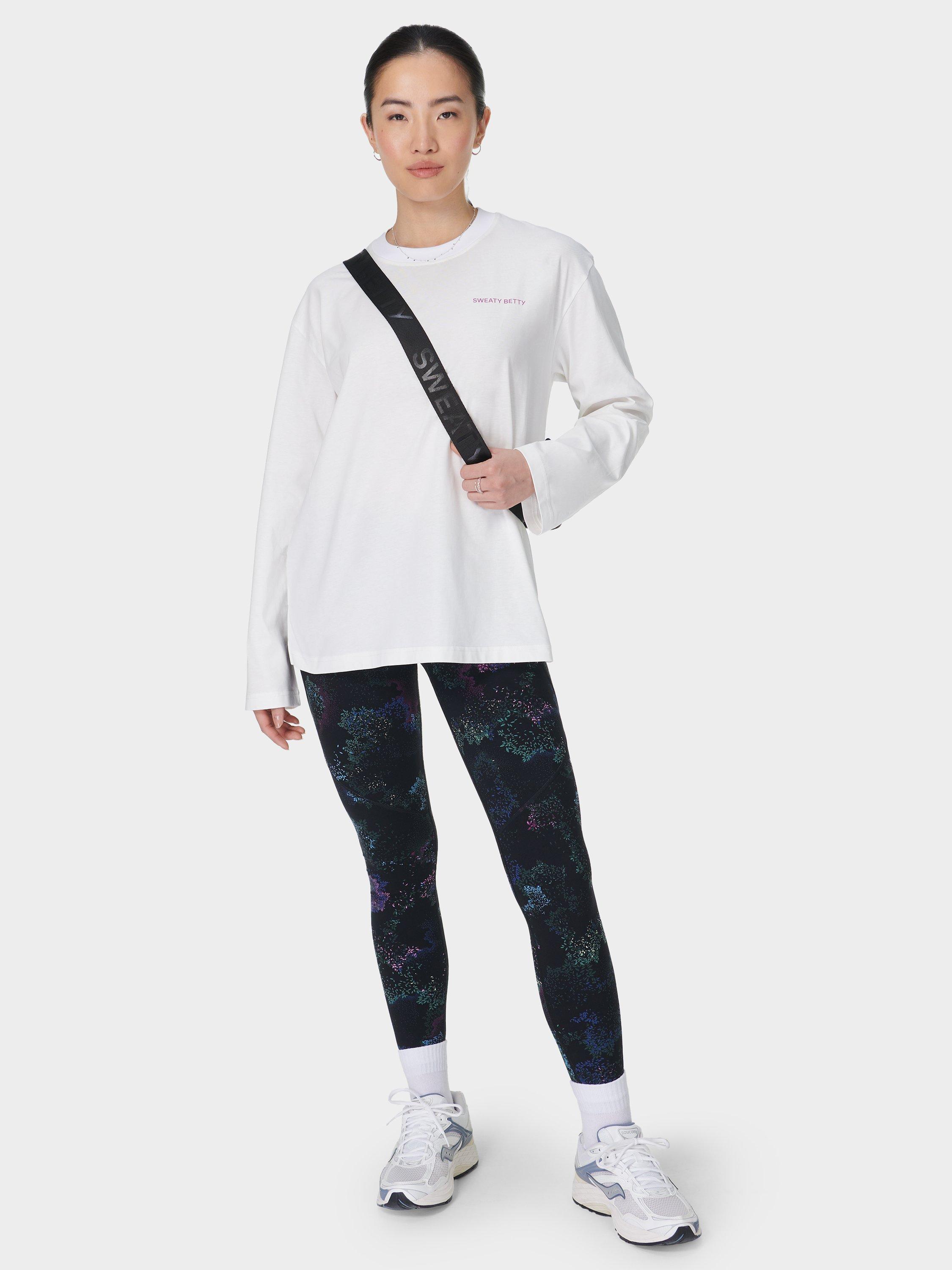 Product image 3 of 7, which shows Sweaty Betty Logo Pure Organic Cotton Long Sleeve Top, Lily White, XXS