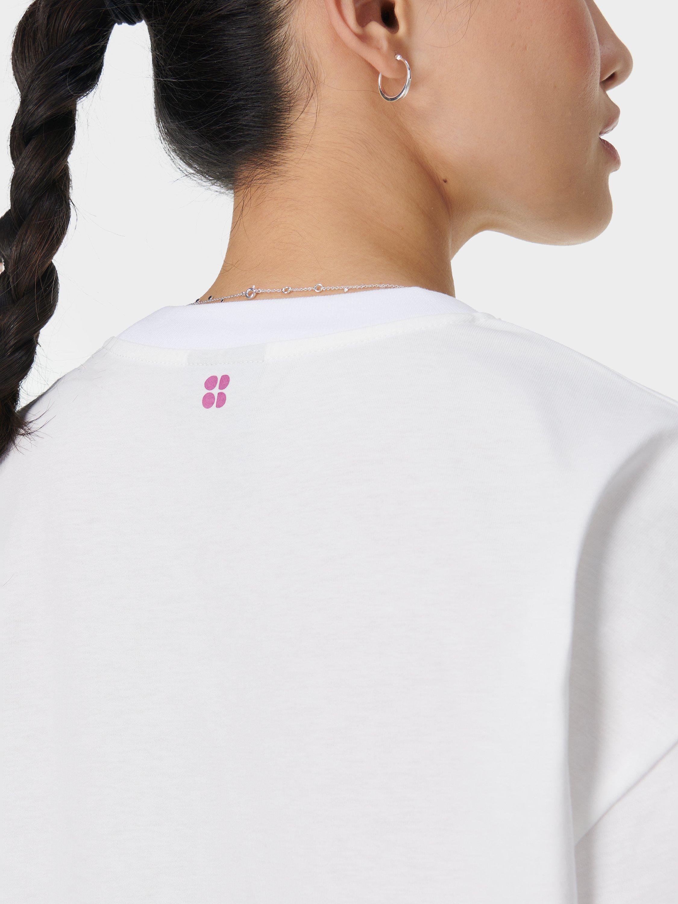 Product image 6 of 7, which shows Sweaty Betty Logo Pure Organic Cotton Long Sleeve Top, Lily White, XXS