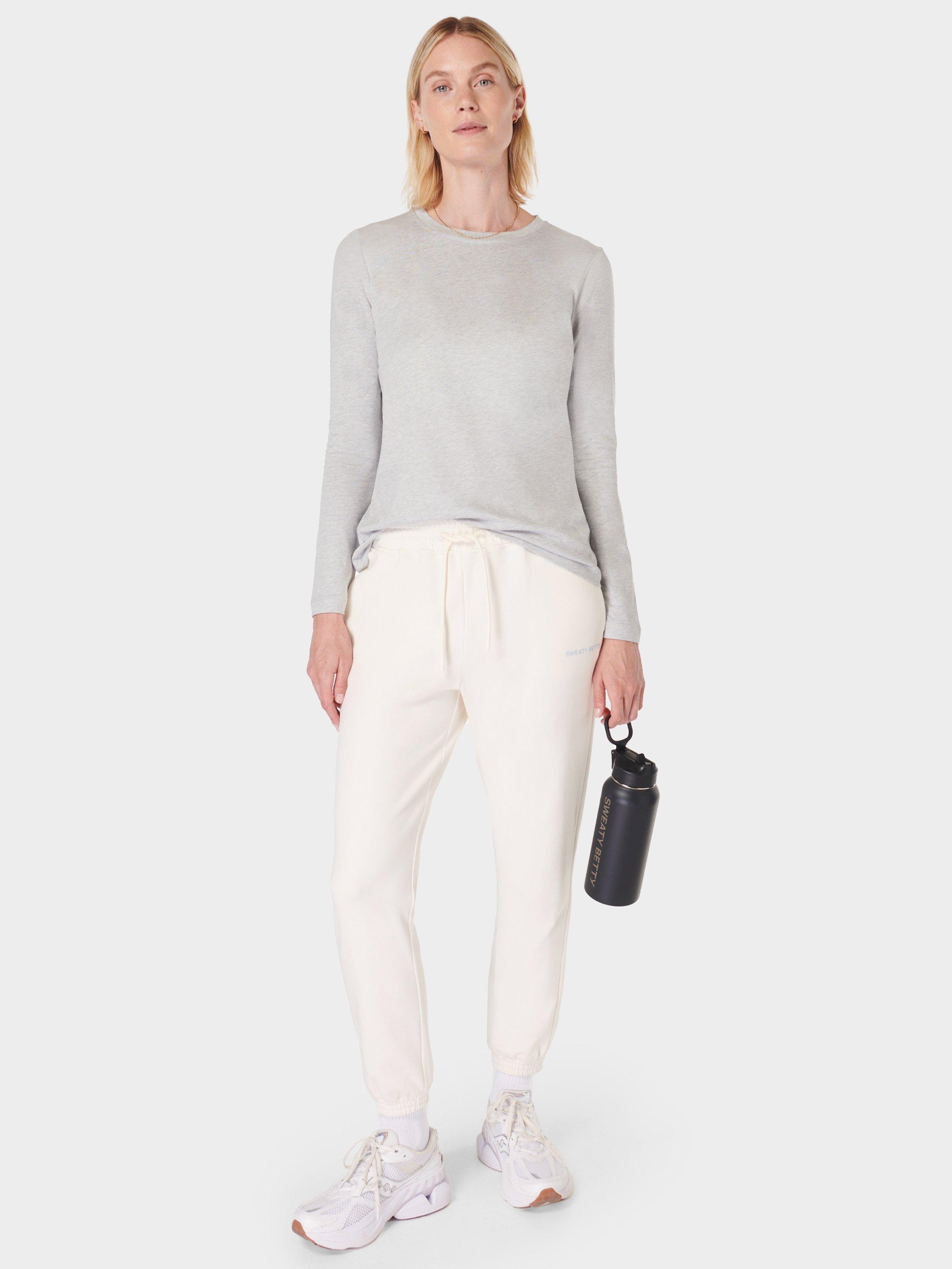 Product image 3 of 7, which shows Sweaty Betty Essential Long Sleeve T-Shirt, Light Grey Marl, XXS