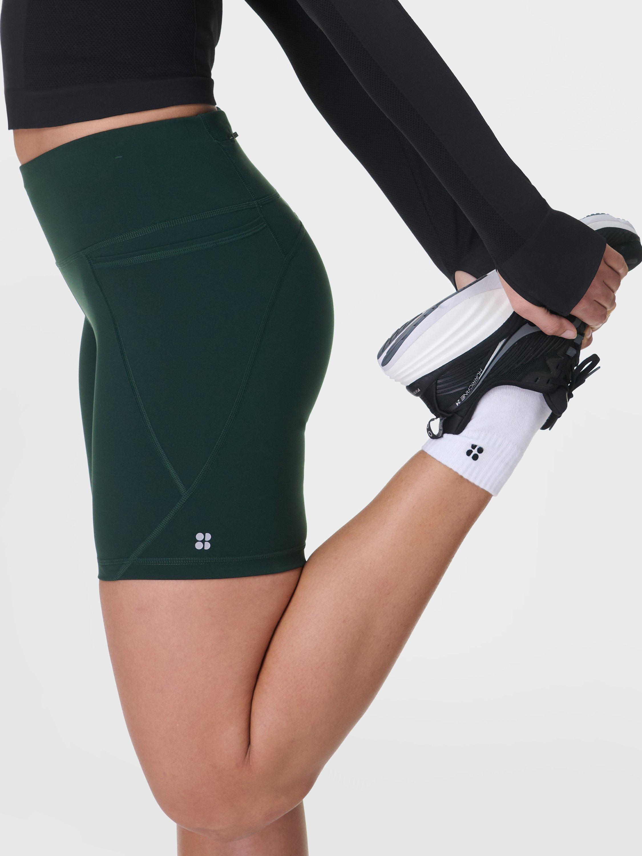Product image 6 of 8, which shows Sweaty Betty Power 6" Biker Shorts, Cedar Green, XXS