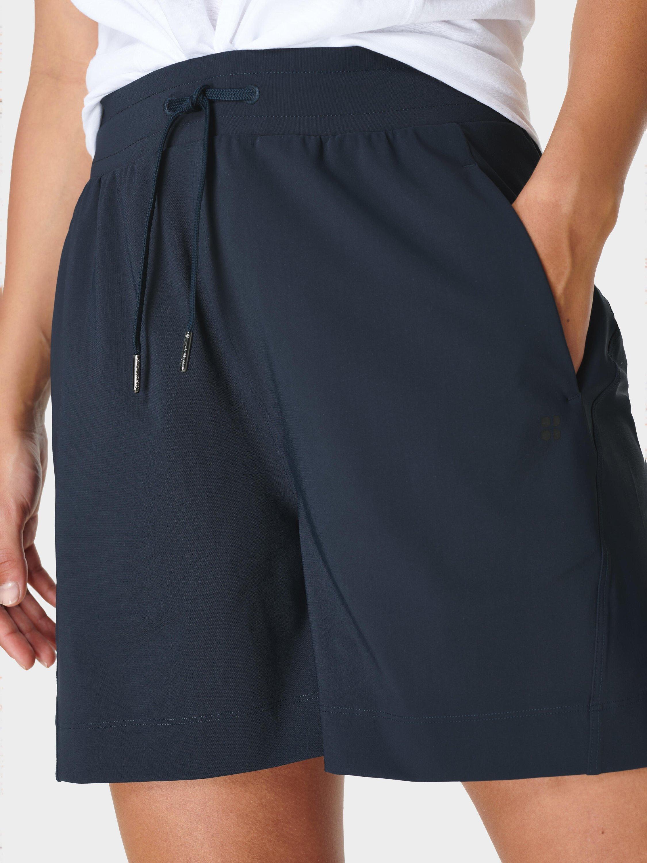 Product image 4 of 7, which shows Sweaty Betty Explorer 5.5" Shorts, Navy Blue, XXS