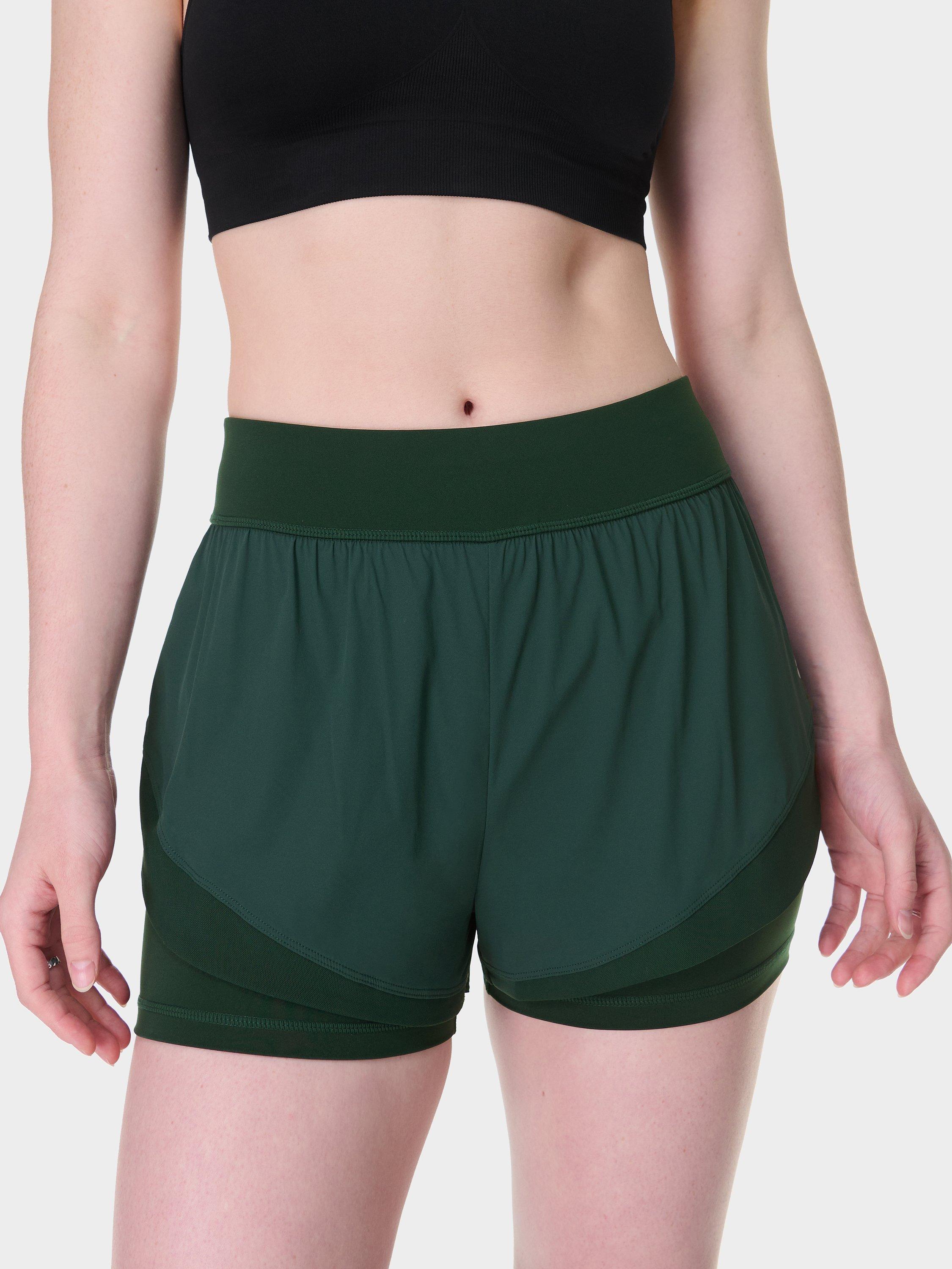 Product image 1 of 8, which shows Sweaty Betty Tempo Run Shorts, Cedar Green, XXS