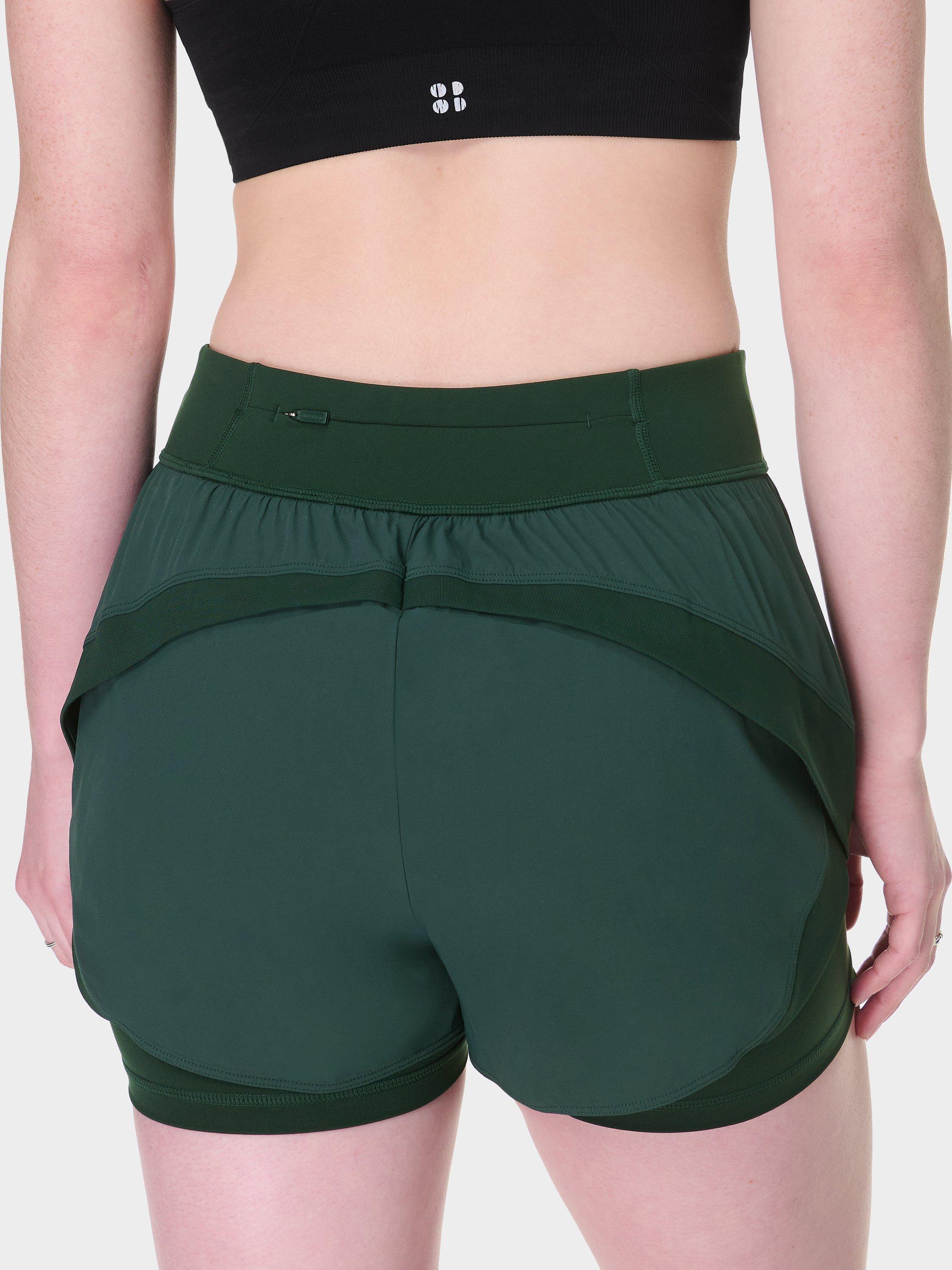 Product image 4 of 8, which shows Sweaty Betty Tempo Run Shorts, Cedar Green, XXS