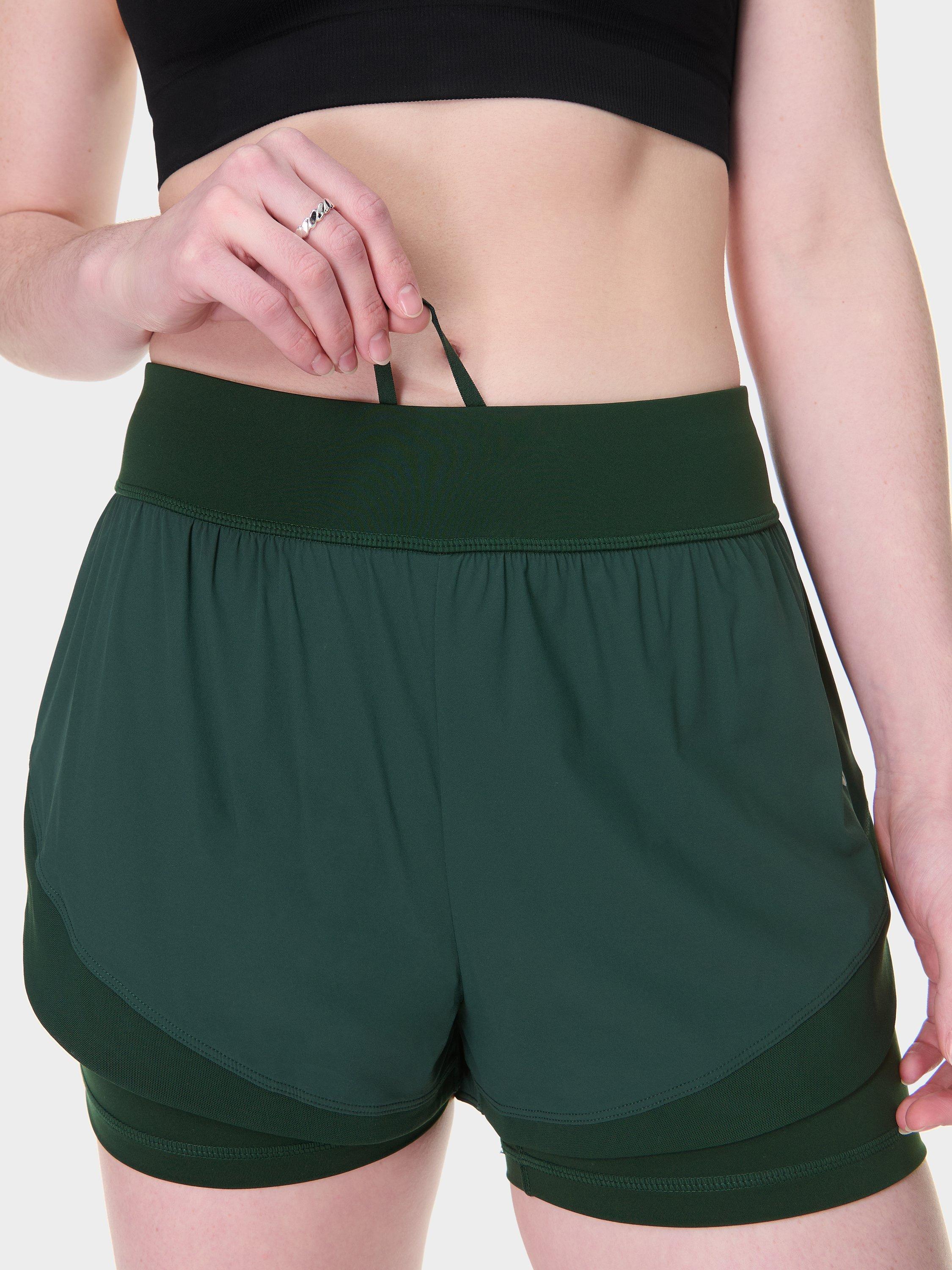 Product image 7 of 8, which shows Sweaty Betty Tempo Run Shorts, Cedar Green, XXS
