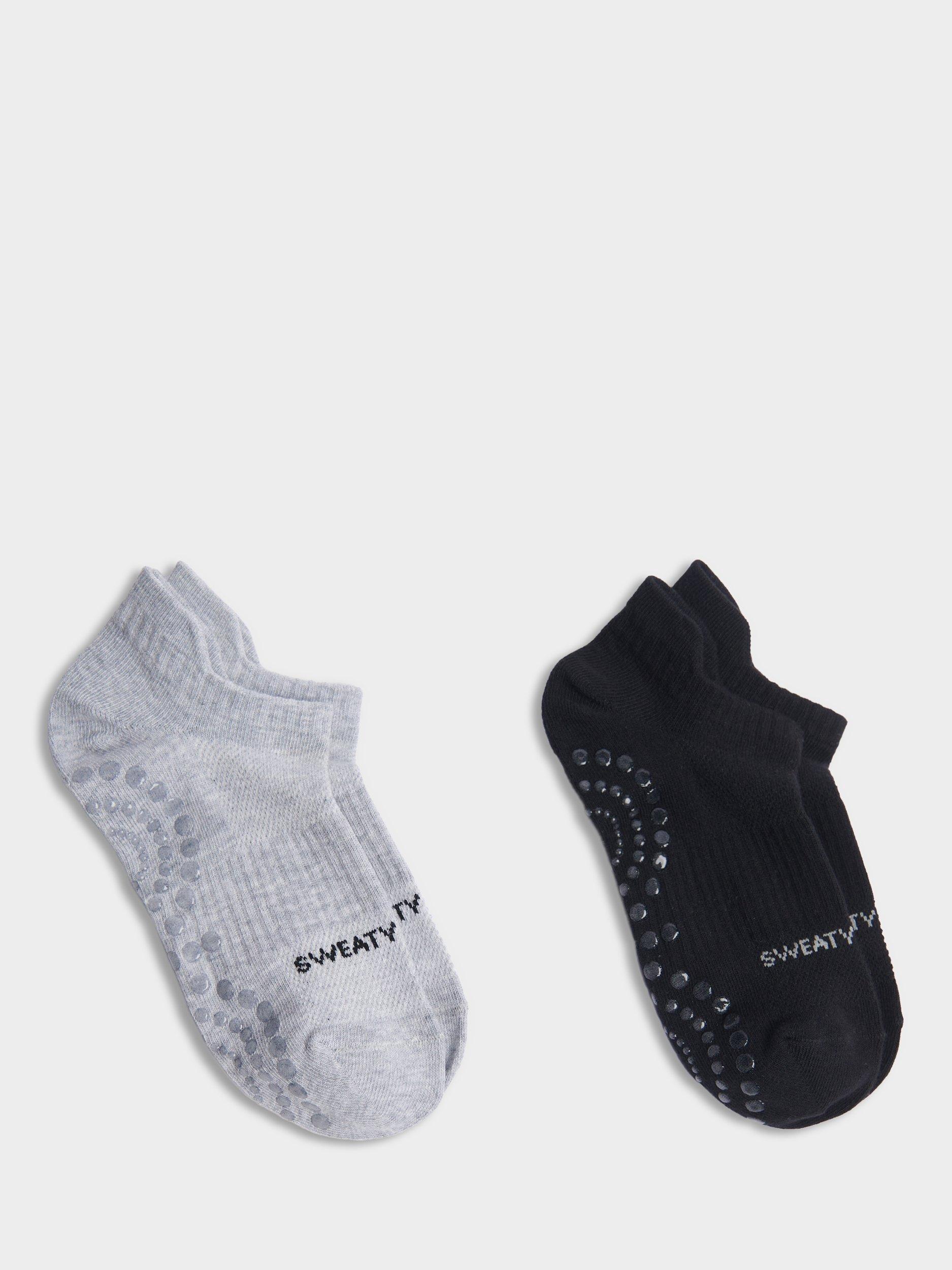 Product image 1 of 3, which shows Sweaty Betty Reformer Gripped Organic Cotton Rich Trainer Socks, Pack of 2, Black/Grey, 2-5