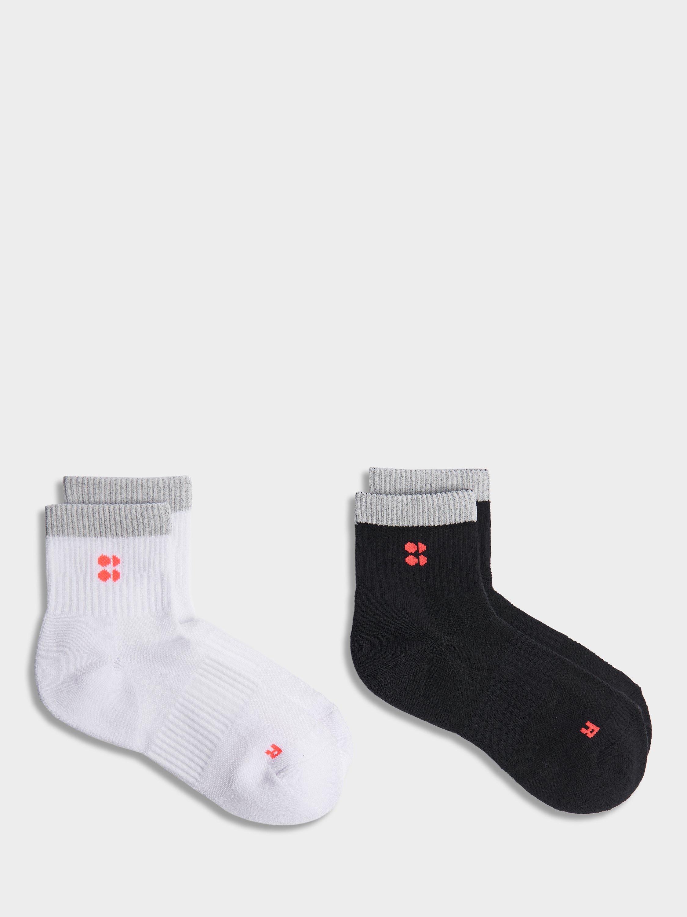 Product image 1 of 3, which shows Sweaty Betty Reflective Organic Cotton Rich Mini Workout Socks, Pack of 2, Blackwhite And Fluro, 2-5