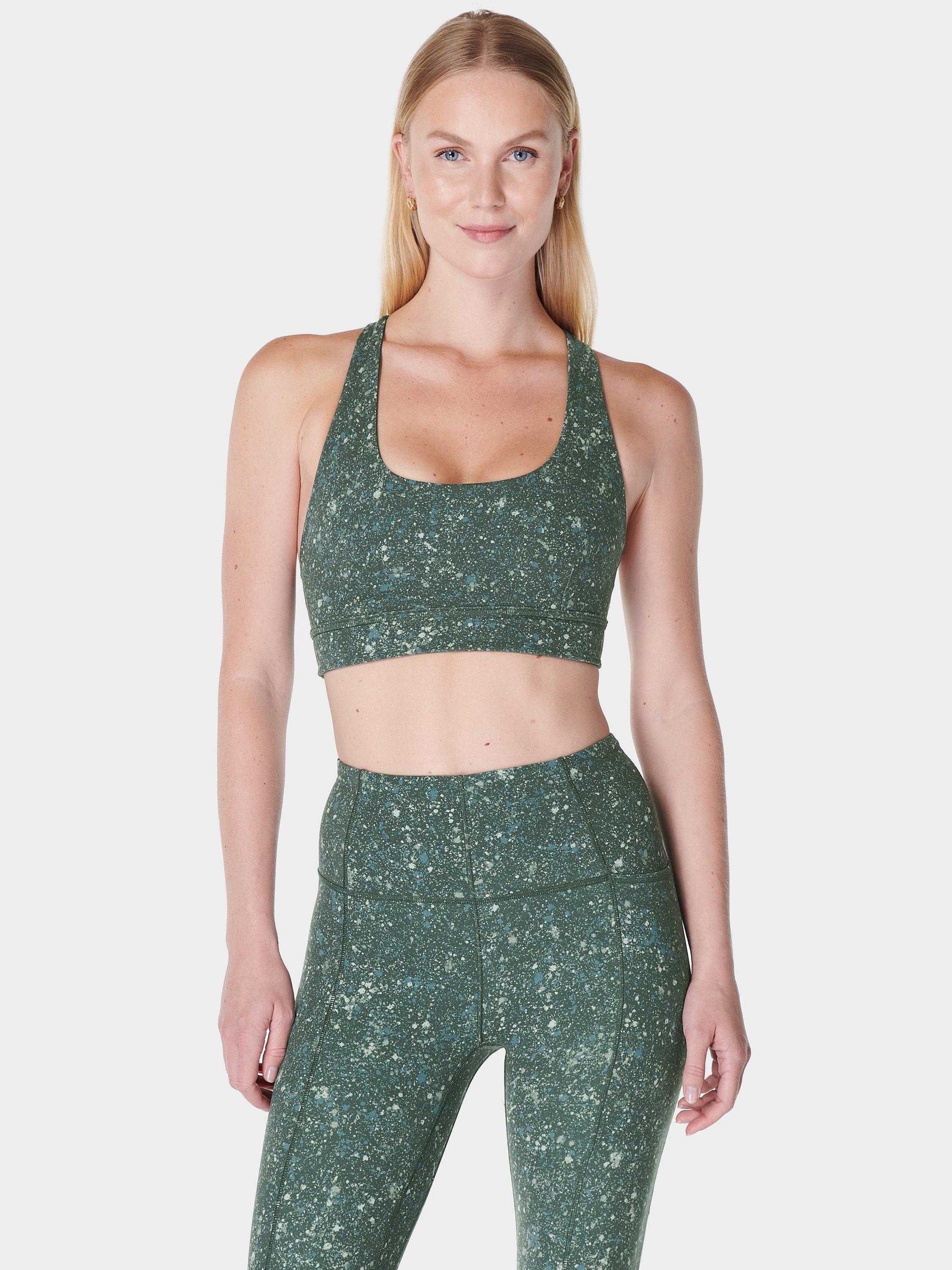 Product image 1 of 9, which shows Sweaty Betty Super Soft Reversible Yoga Sports Bra, Green Speckle Print, XS
