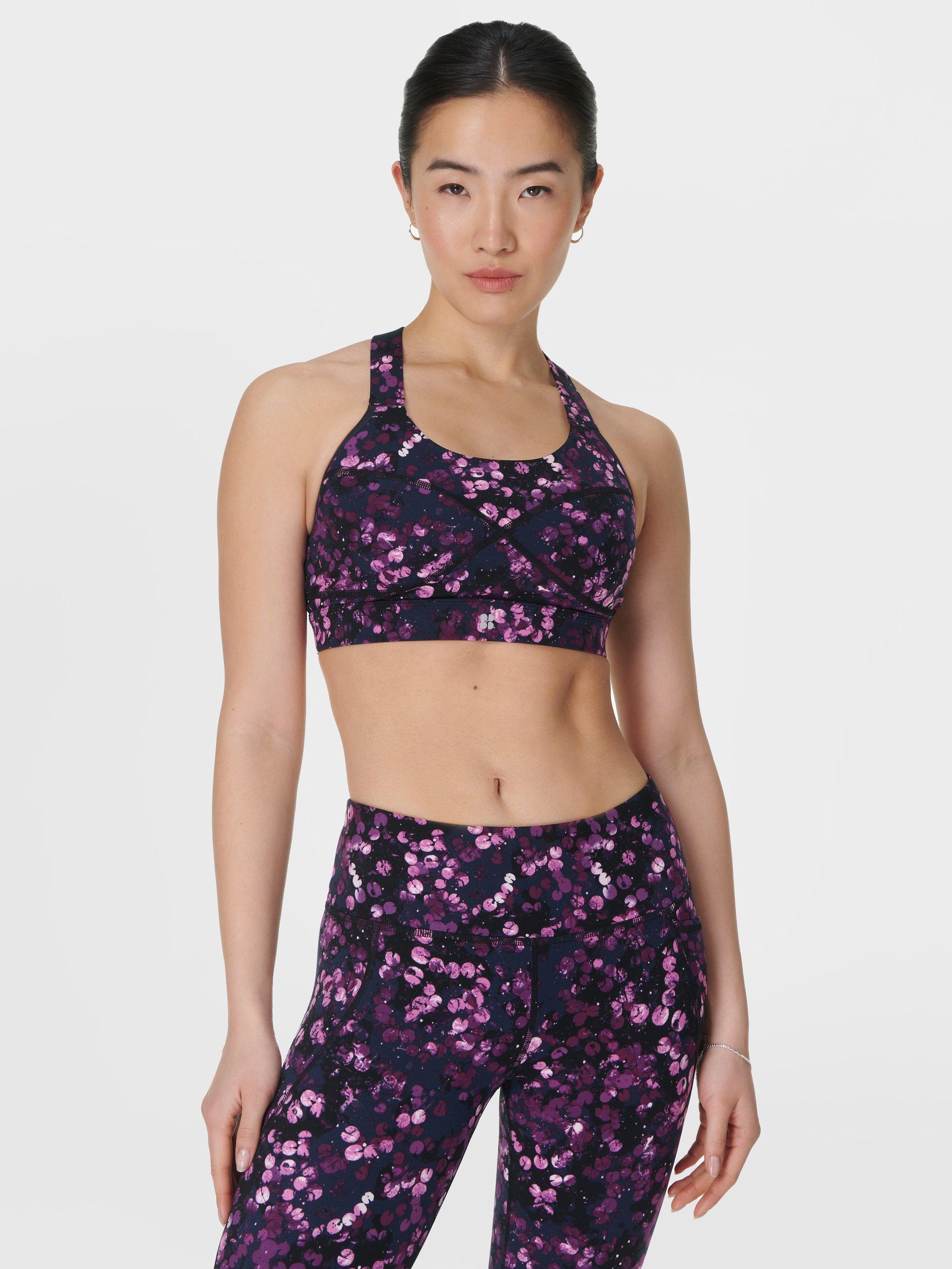 Product image 1 of 7, which shows Sweaty Betty Power Medium Impact Sports Bra, Purple Lilypad, S