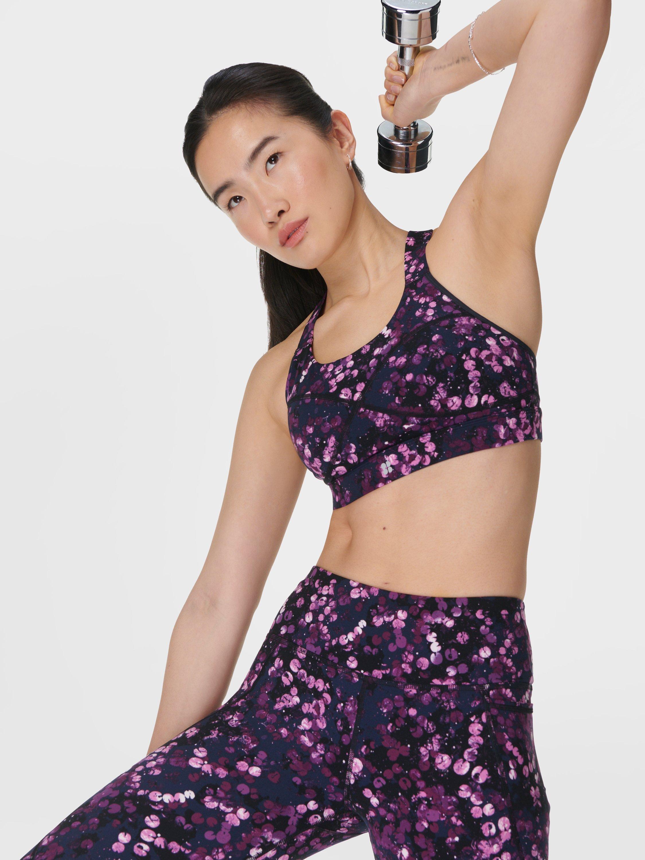 Product image 5 of 7, which shows Sweaty Betty Power Medium Impact Sports Bra, Purple Lilypad, S