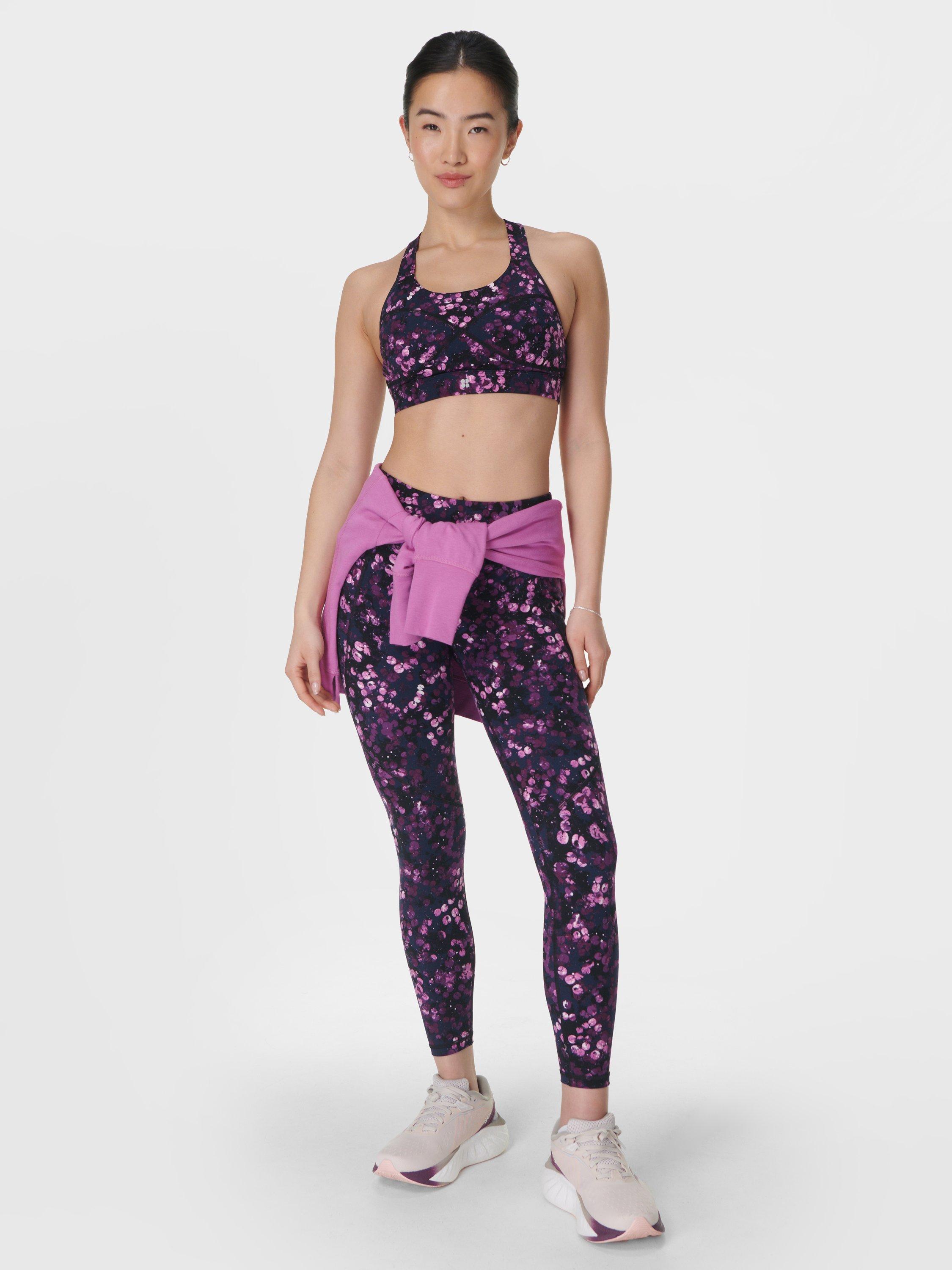 Product image 6 of 7, which shows Sweaty Betty Power Medium Impact Sports Bra, Purple Lilypad, S