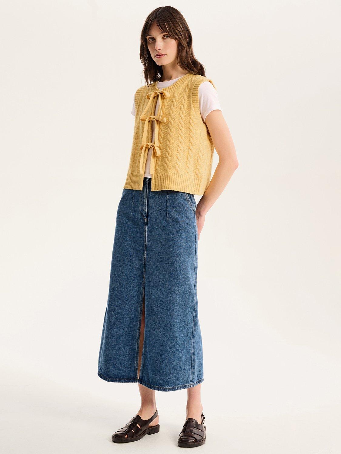 Product image 1 of 5, which shows OMNES Jacob Cable Knit Sleeveless Jumper, Yellow, XS
