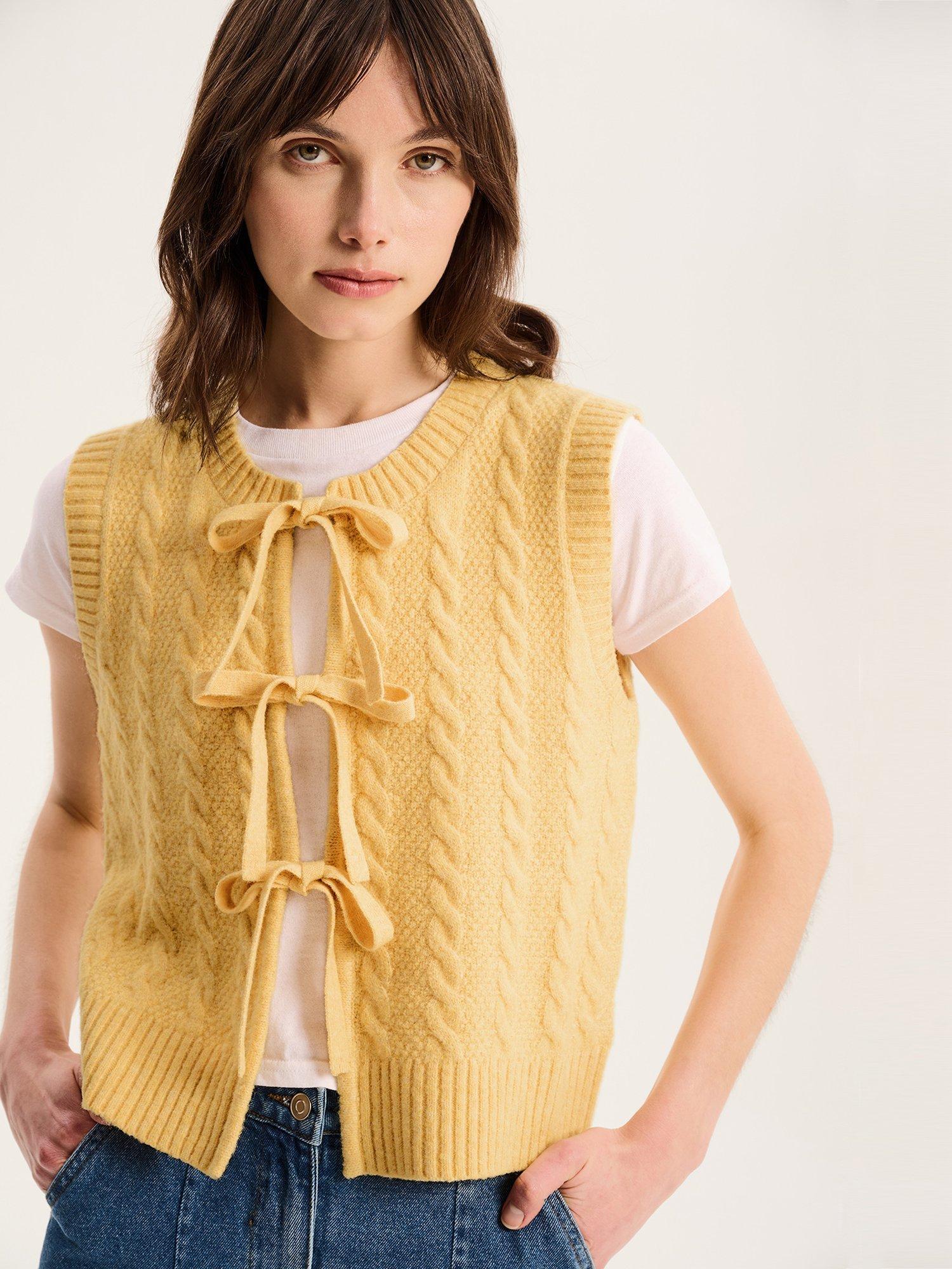 Product image 4 of 5, which shows OMNES Jacob Cable Knit Sleeveless Jumper, Yellow, XS