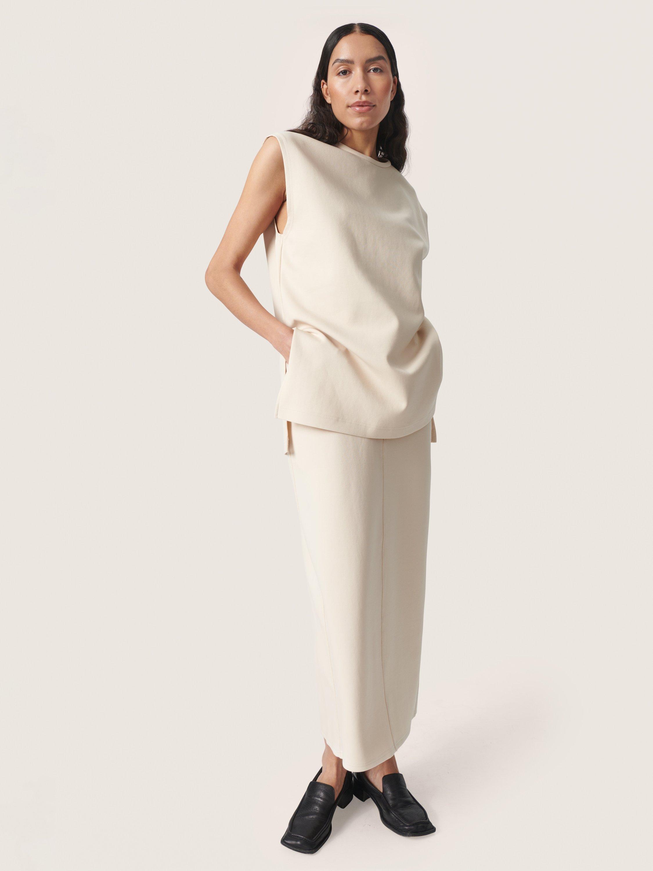 Product image 3 of 6, which shows Soaked In Luxury Anastasia Longline Sleeveless Top, Sandshell, XS