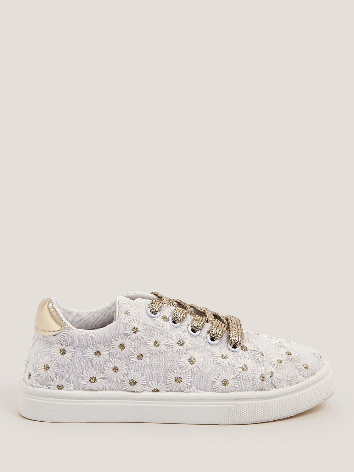 Product image 1 of 3, which shows Monsoon Kids' Flowal Embroidered Trainers, White/Gold, 10 Jnr