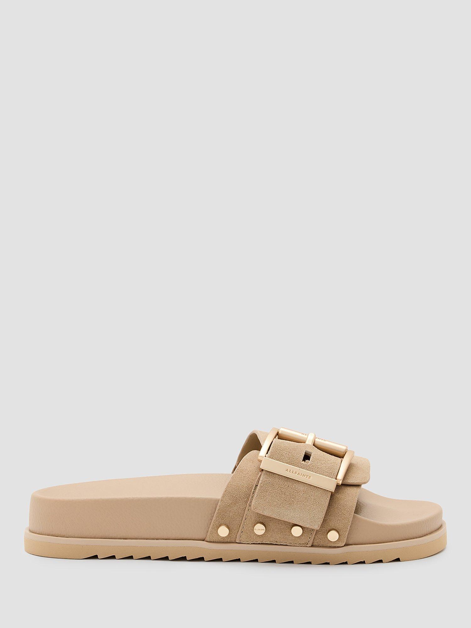 Product image 1 of 5, which shows AllSaints Ellie Suede Buckle Stud Sliders, Natural Sand, EU38