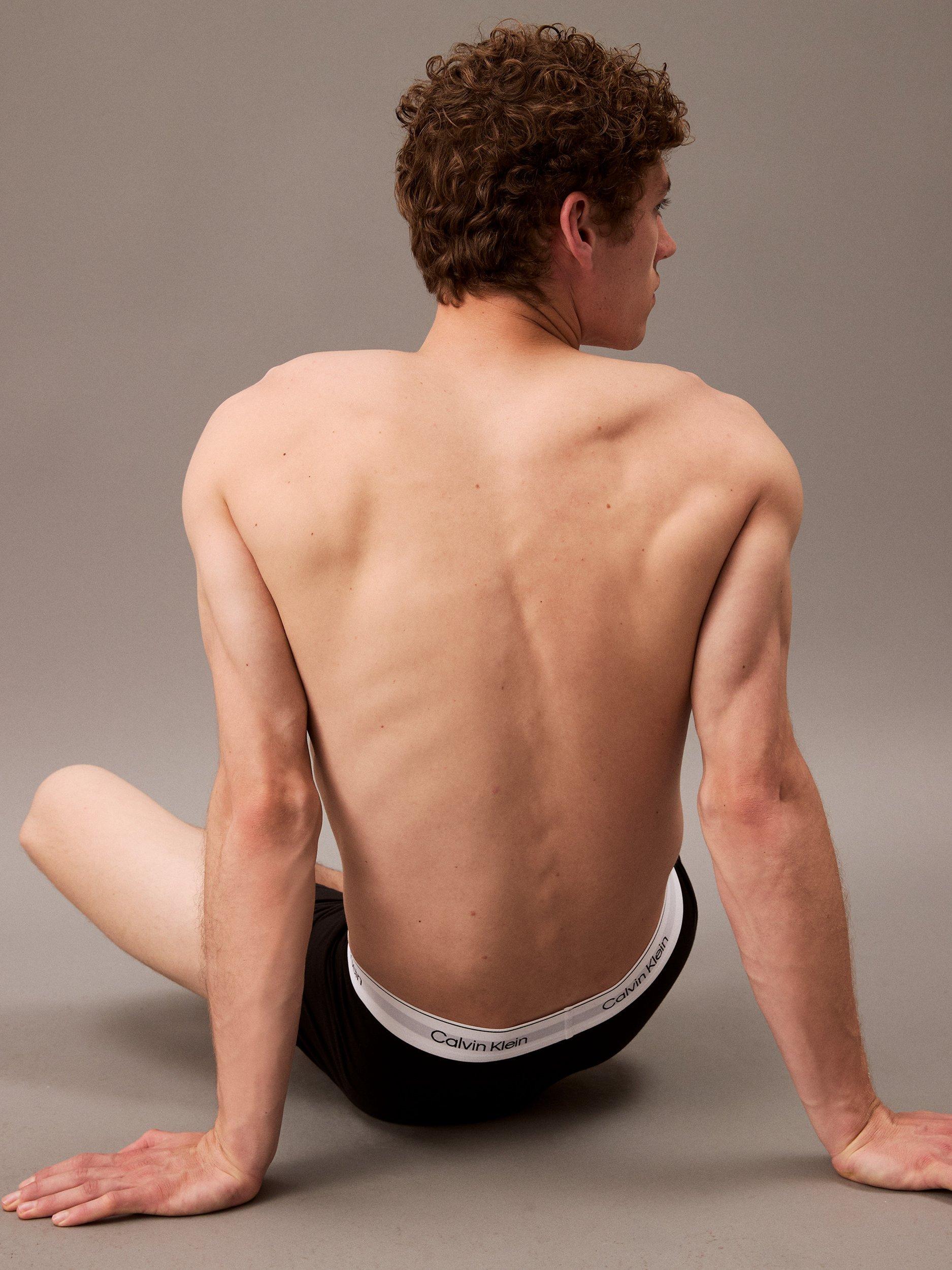 Product image 6 of 6, which shows Calvin Klein Icon Stretch Cotton Boxer Briefs, Pack of 3, Black, XS