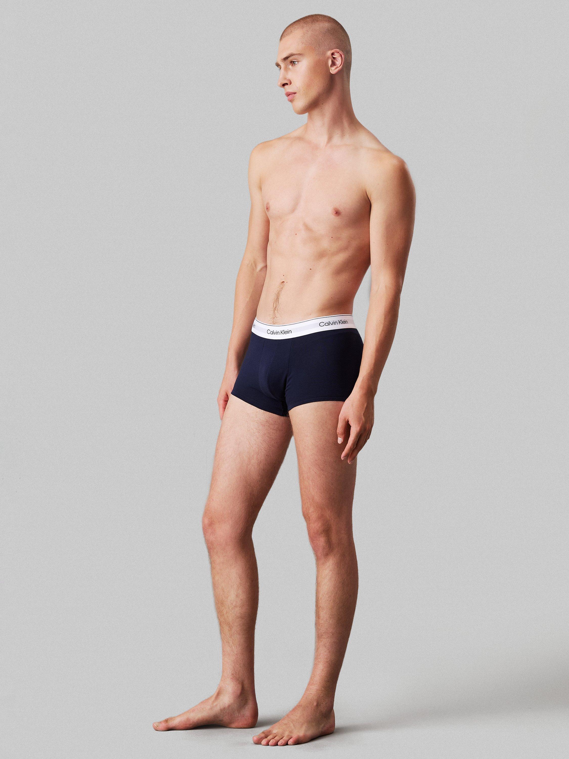 Product image 2 of 6, which shows Calvin Klein Icon Low Rise Stretch Trunks, Pack of 3, Shoreline, Gr Heathe, S
